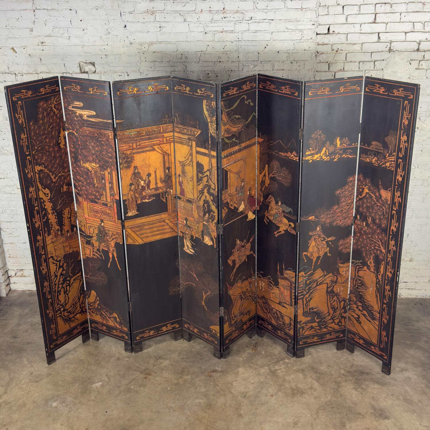 Biombo chino Coromandel negro de 8 paneles con calcografía dorada y pintada a mano Chino en venta