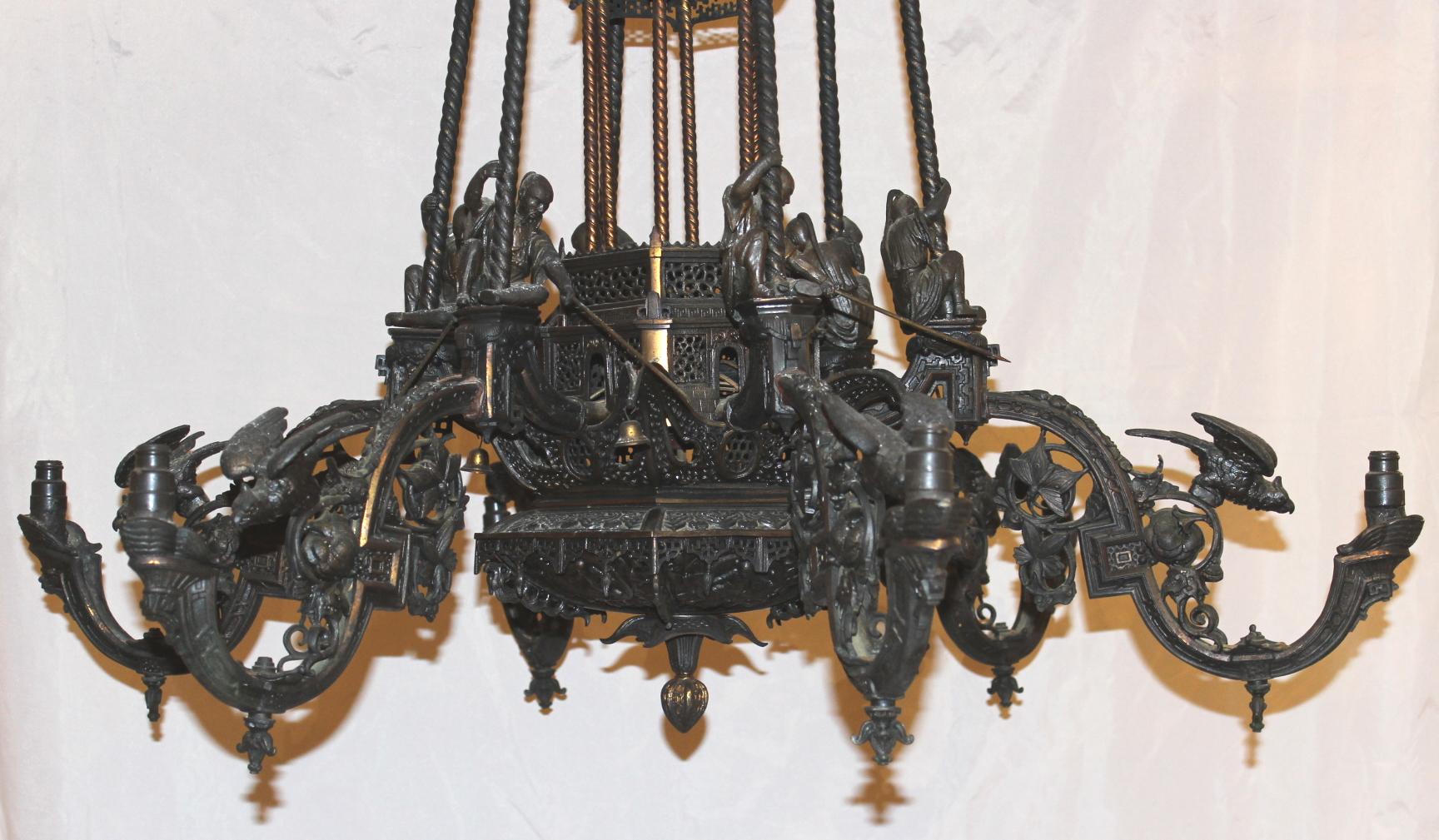 A fine Chinese aesthetic six-light spelter chandelier, each arm featuring an armed warrior poised to attack at the top of each light arm, and each arm decorated a full bird poised to fly, along with small bells, foliate and butterfly decoration