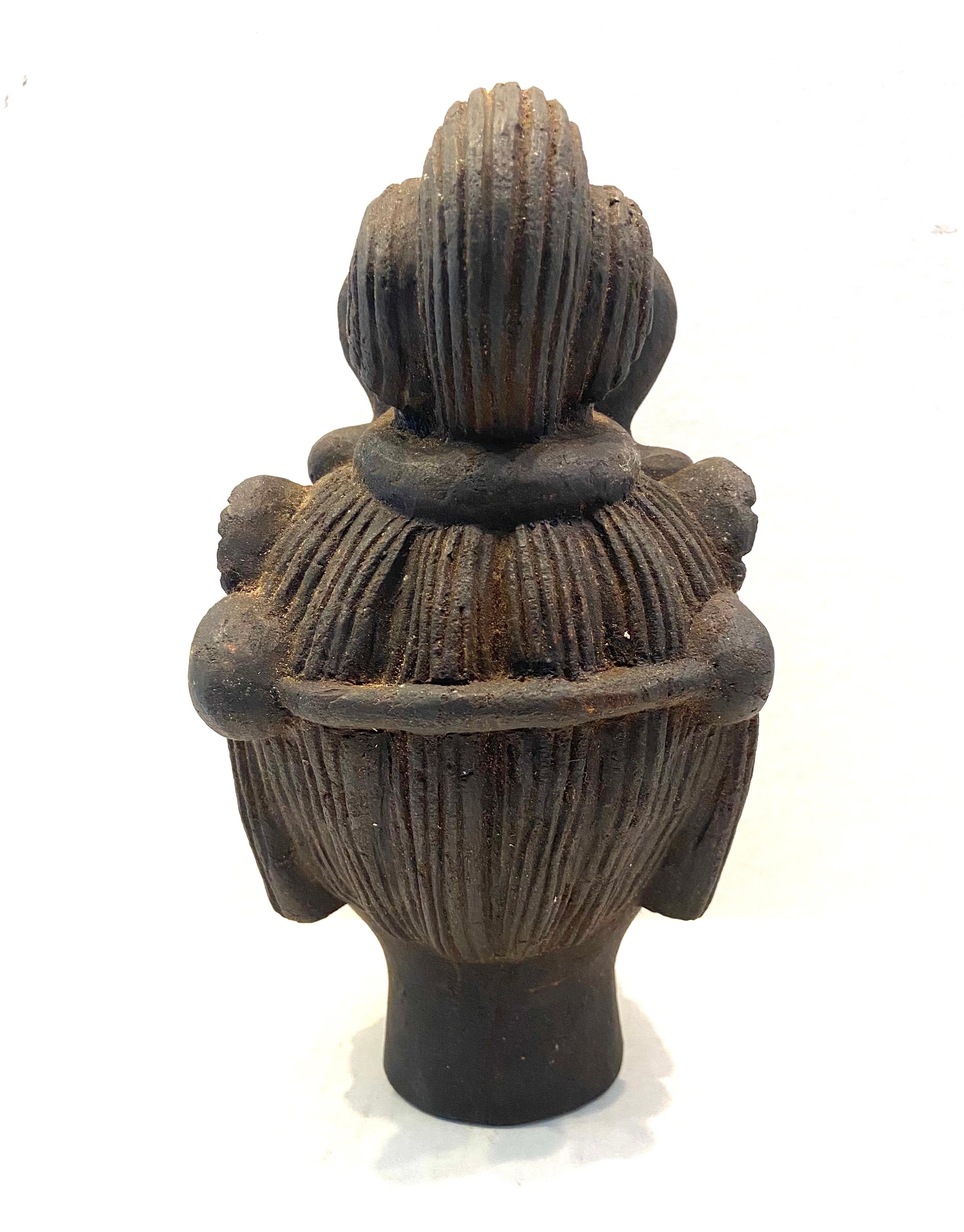 Fine Chinese agarwood Guan Yin Head, black polychrome. 20th century.
Agarwood is a fragrant dark resinous wood used in incense, perfume, and carvings. One of the main reasons for the relative rarity and high cost of Agarwood is the depletion of the