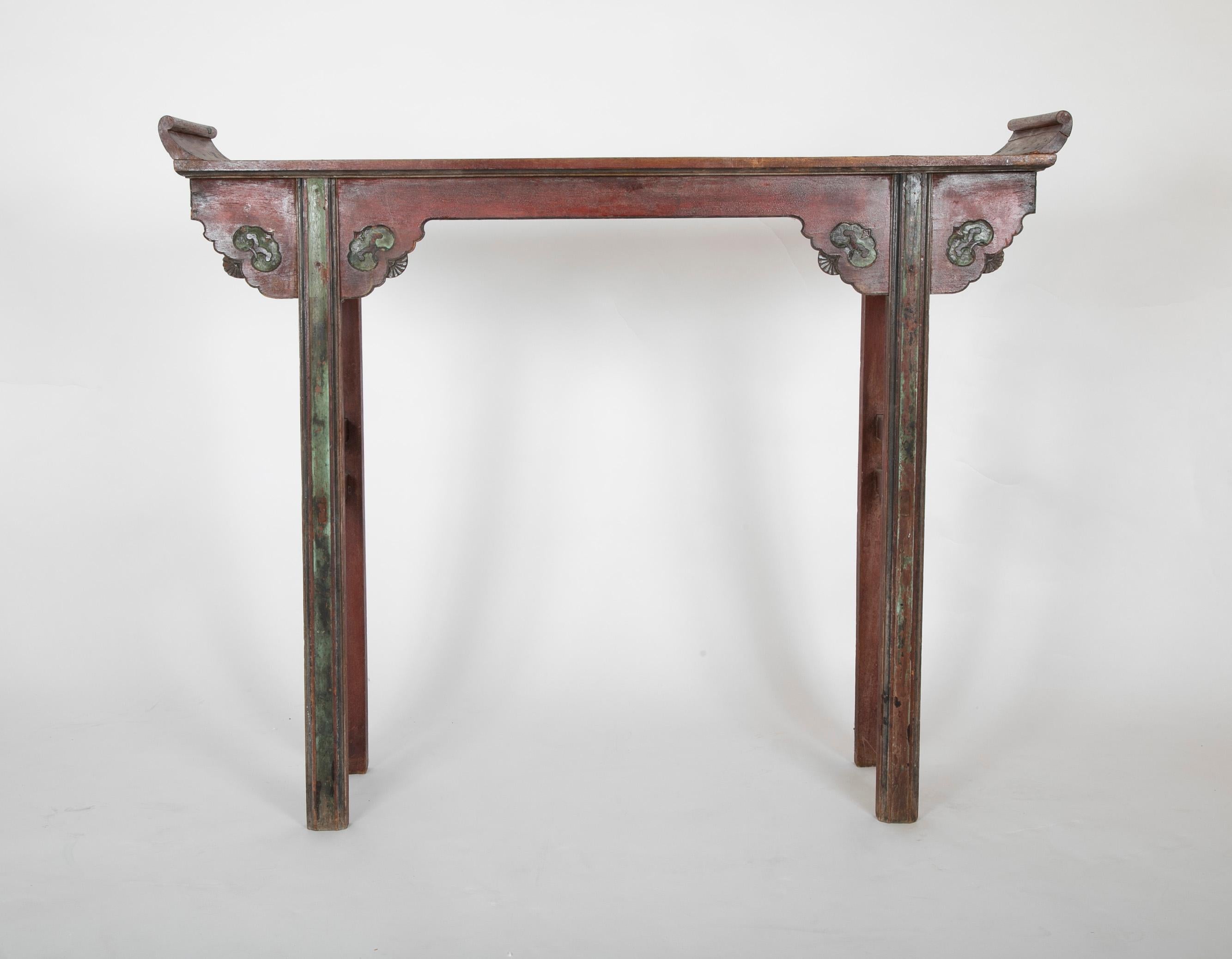 A tall Chinese altar table with original lacquer finish.
  
