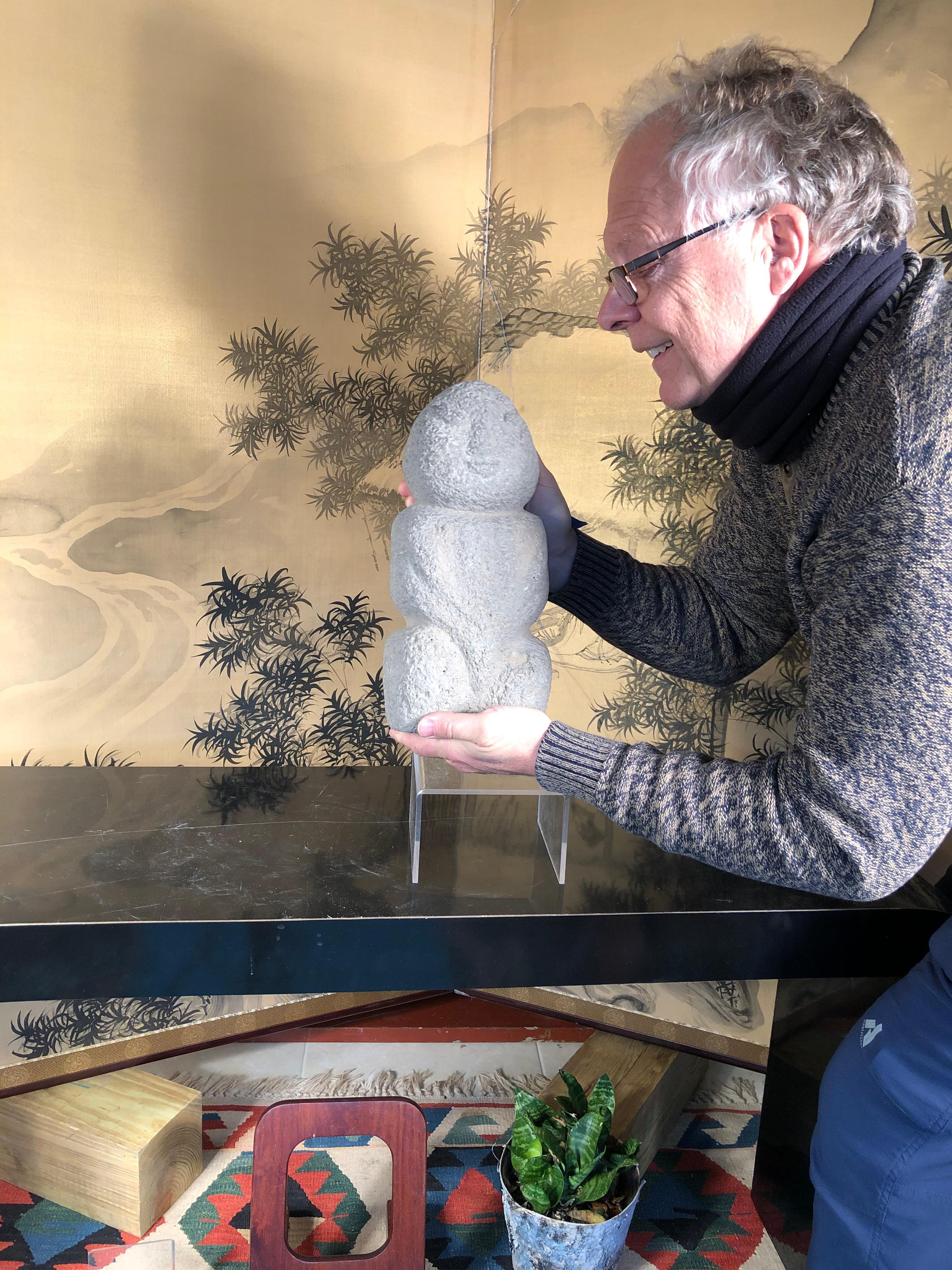 China, a fine archaic male effigy hand carved from a granular medium to dark gray stone. Neolithic period, Hongshan culture (circa 4700-2900 BC)

Likely a fertility fetish. Note the pecked surfaces and the stone carved hair line top knot.

Quality: