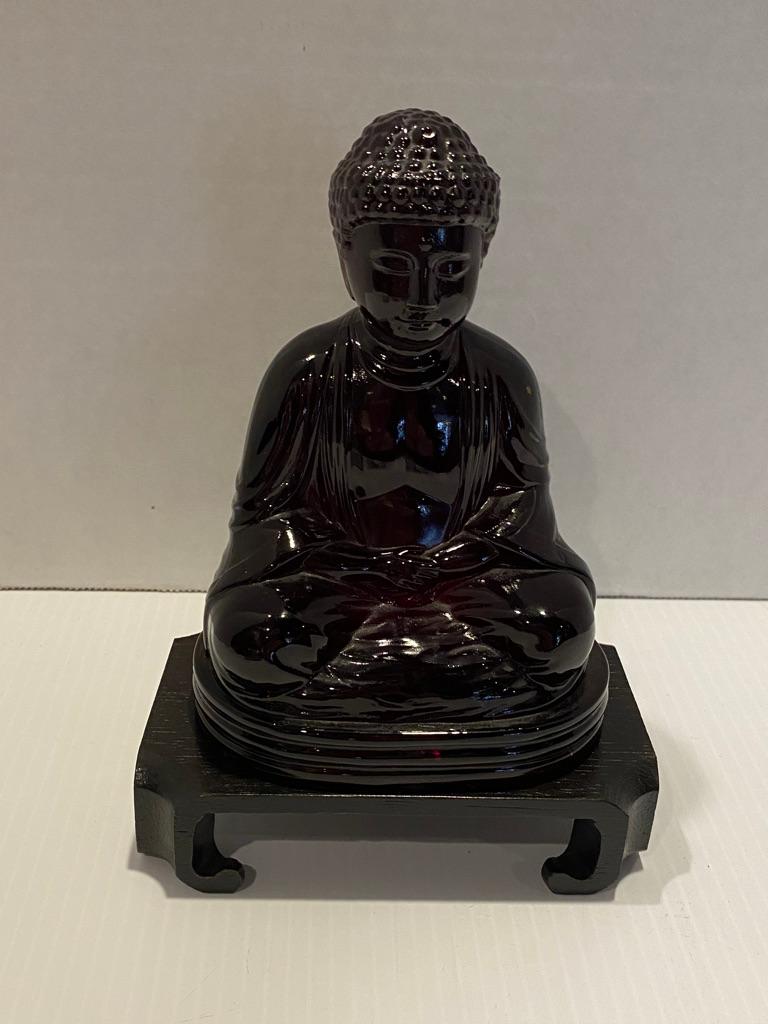 Red amber gillinder glass original paperweight cast in many colors and widely reproduced in recent years. But this is an original the position is double lotus, eyes half closed and focused concentration represents stability whichs creates pease and