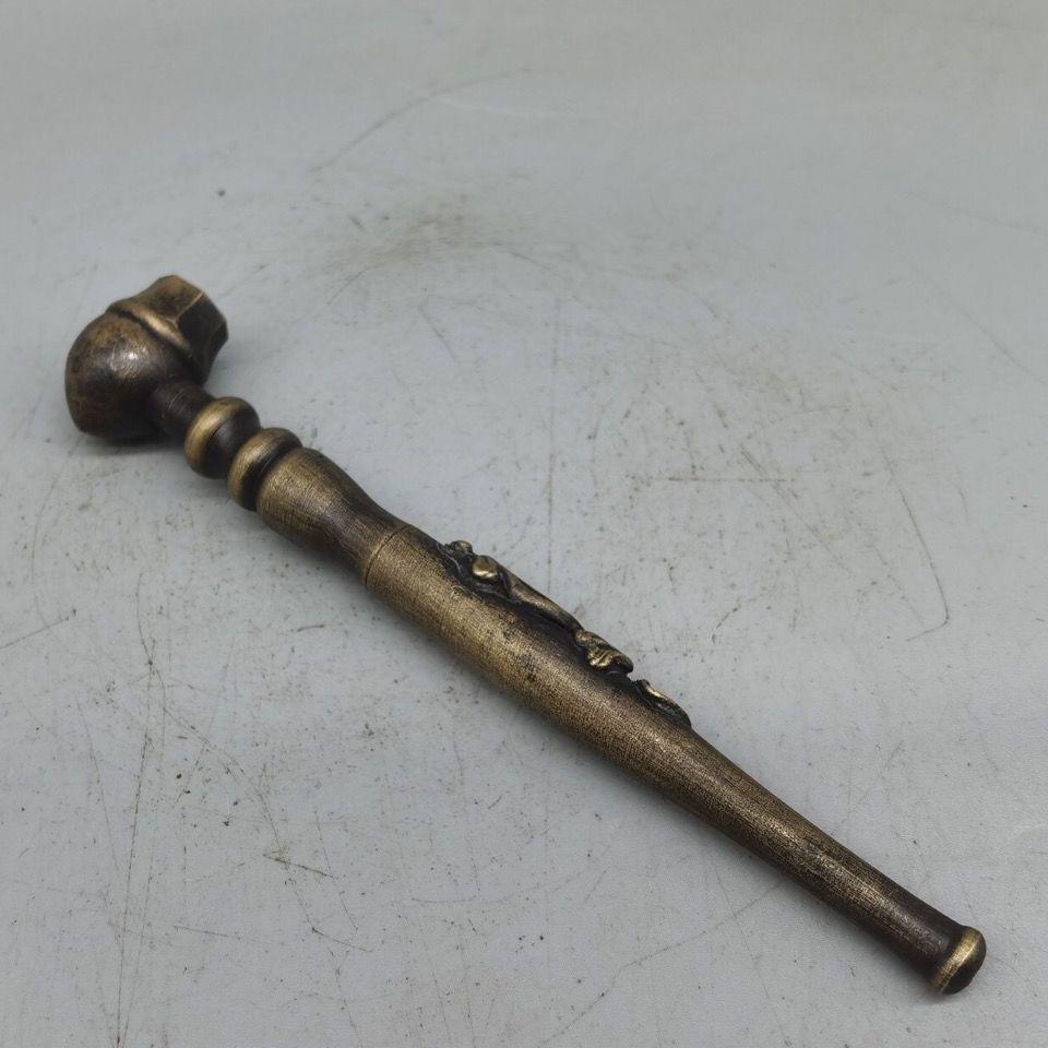 This Vintage Chinese Bronze Smoking Instrument combines traditional craftsmanship with cultural significance. Made from high-quality bronze, this classic piece is intricately designed, reflecting the artistry and elegance of ancient Chinese smoking