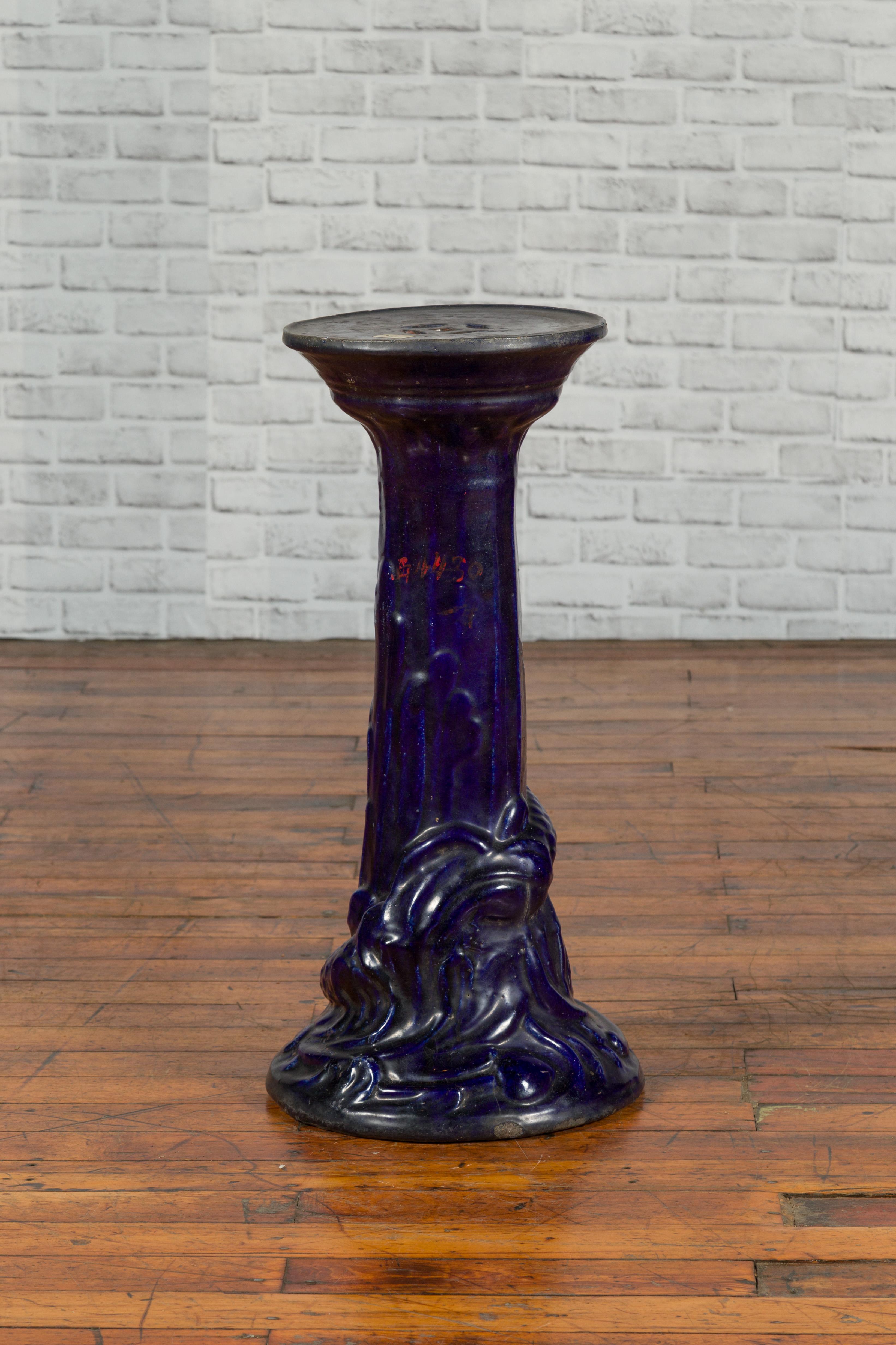 Chinese Antique Dark Blue Glazed Pedestal Stand with Raised Motifs In Good Condition For Sale In Yonkers, NY