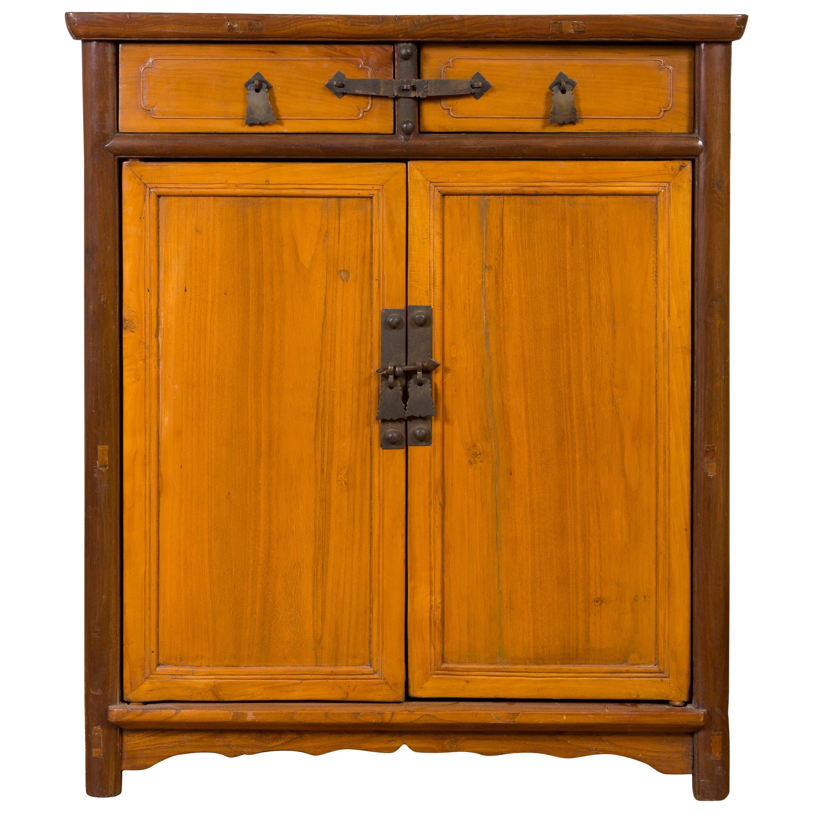 Chinese Antique Elm Two-Toned Cabinet with Cut Bronze Hardware and Yellow Patina For Sale