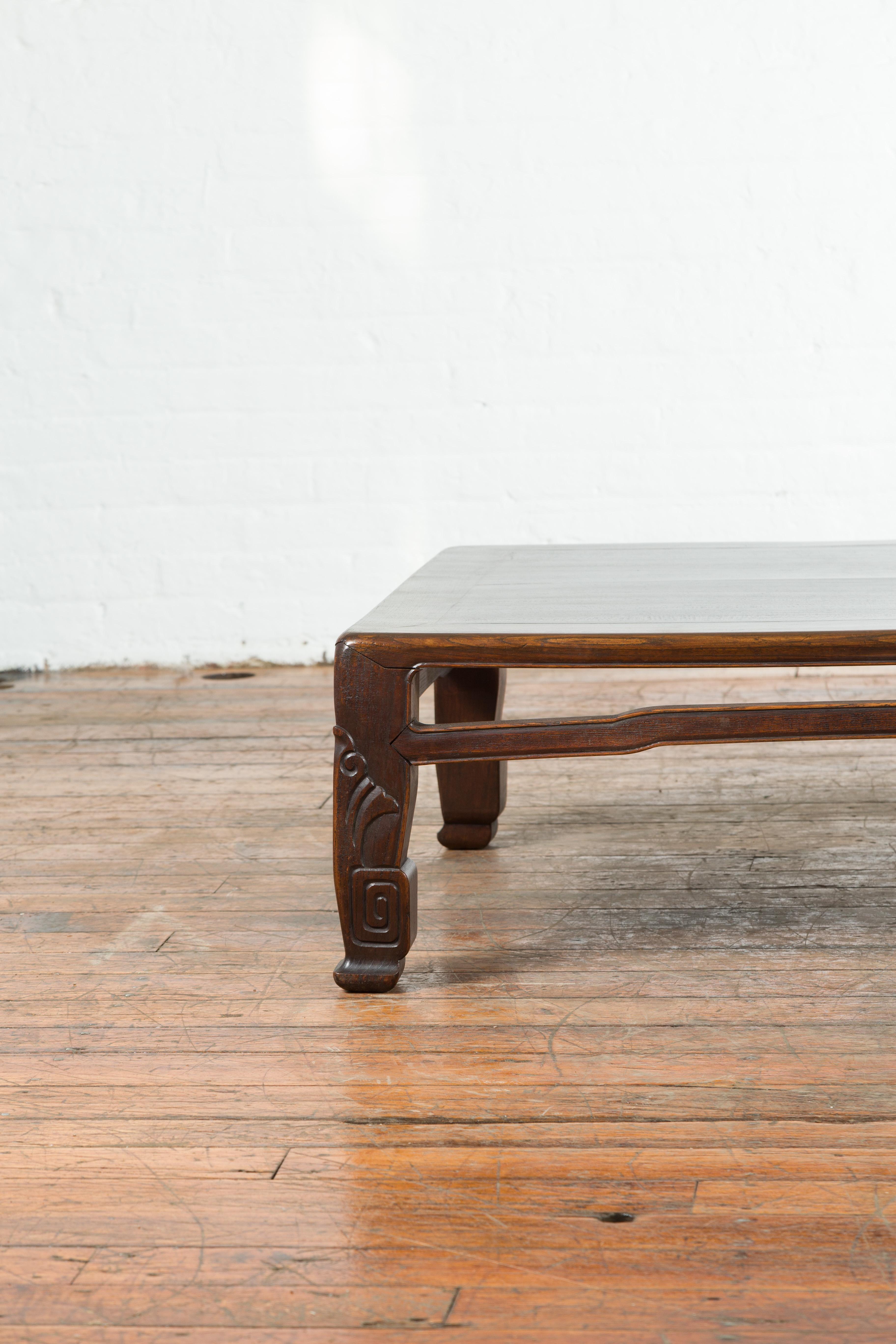 20th Century Chinese Antique Elmwood Coffee Table with Scrolling Feet and Humpback Stretchers For Sale