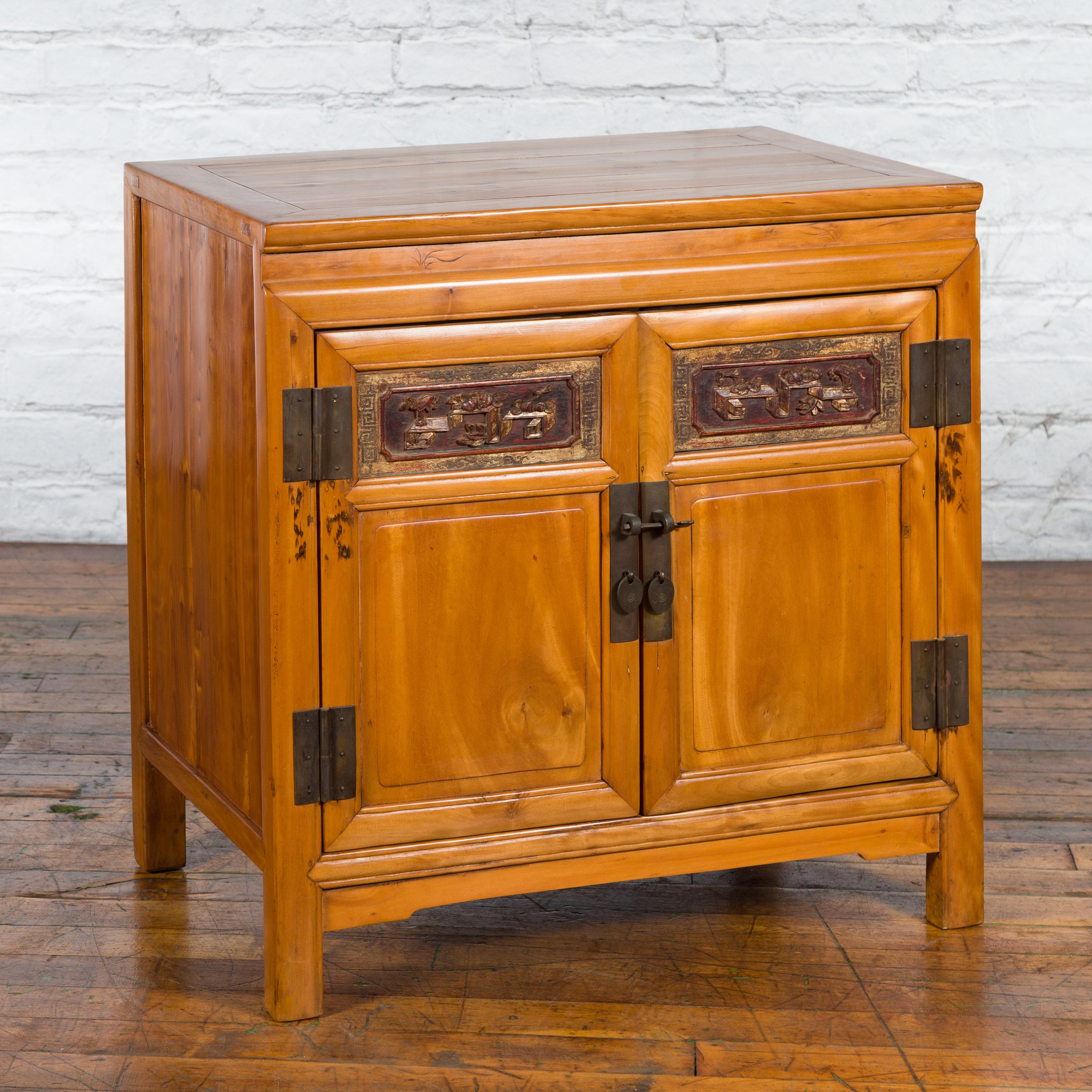 20th Century Chinese Antique Elmwood Side Cabinet with Carved Panels and Hidden Drawers For Sale