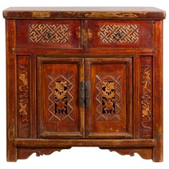 Chinese Antique Lacquered Cabinet with Carved Fretwork and Floral Motifs