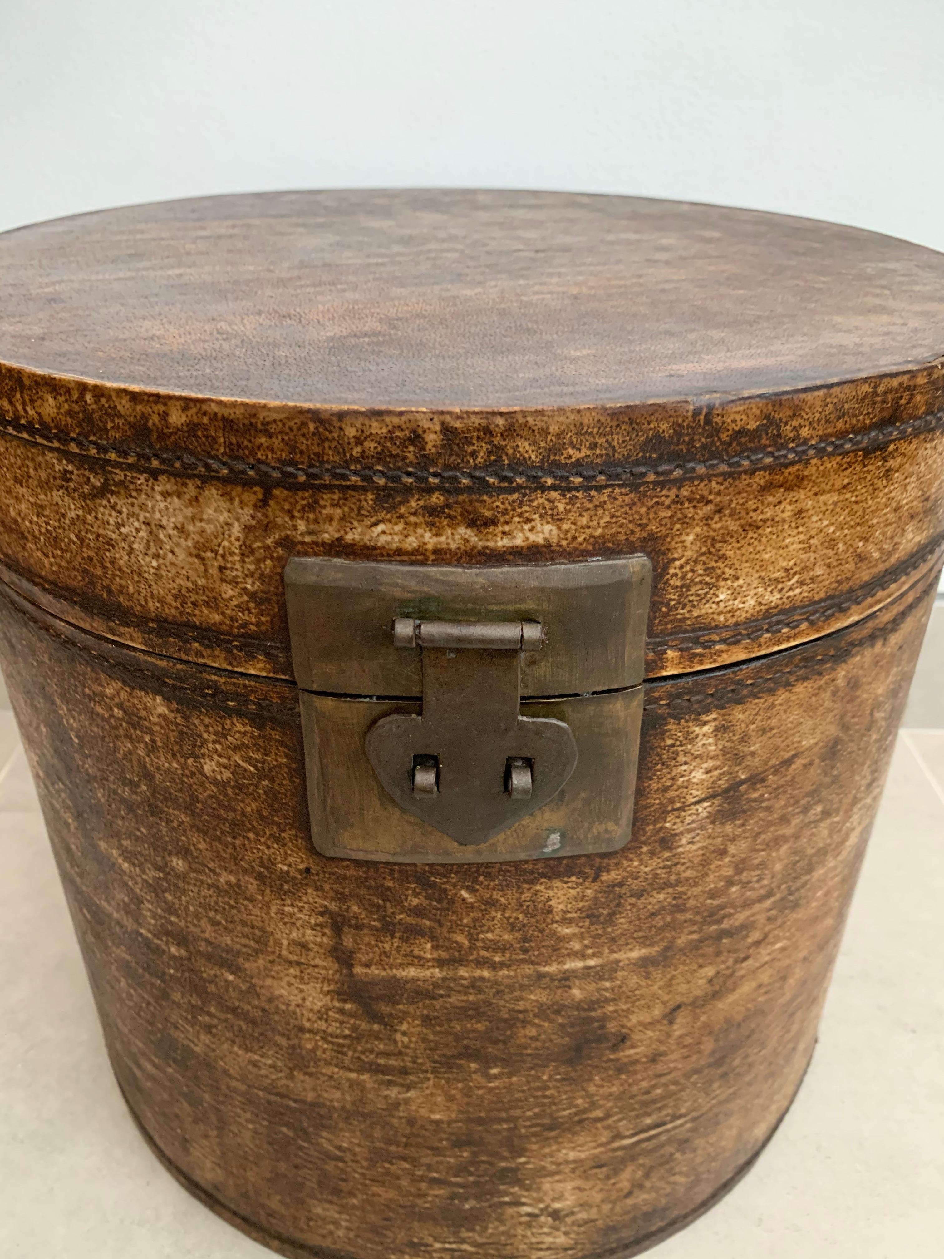 Amid the Qing Dynasty Hats were a form of status symbol, so much so that the boxes to protect and preserve these hats were also elegantly crafted. This late 19th-century hat box is crafted from lacquered leather and once belonged to someone high