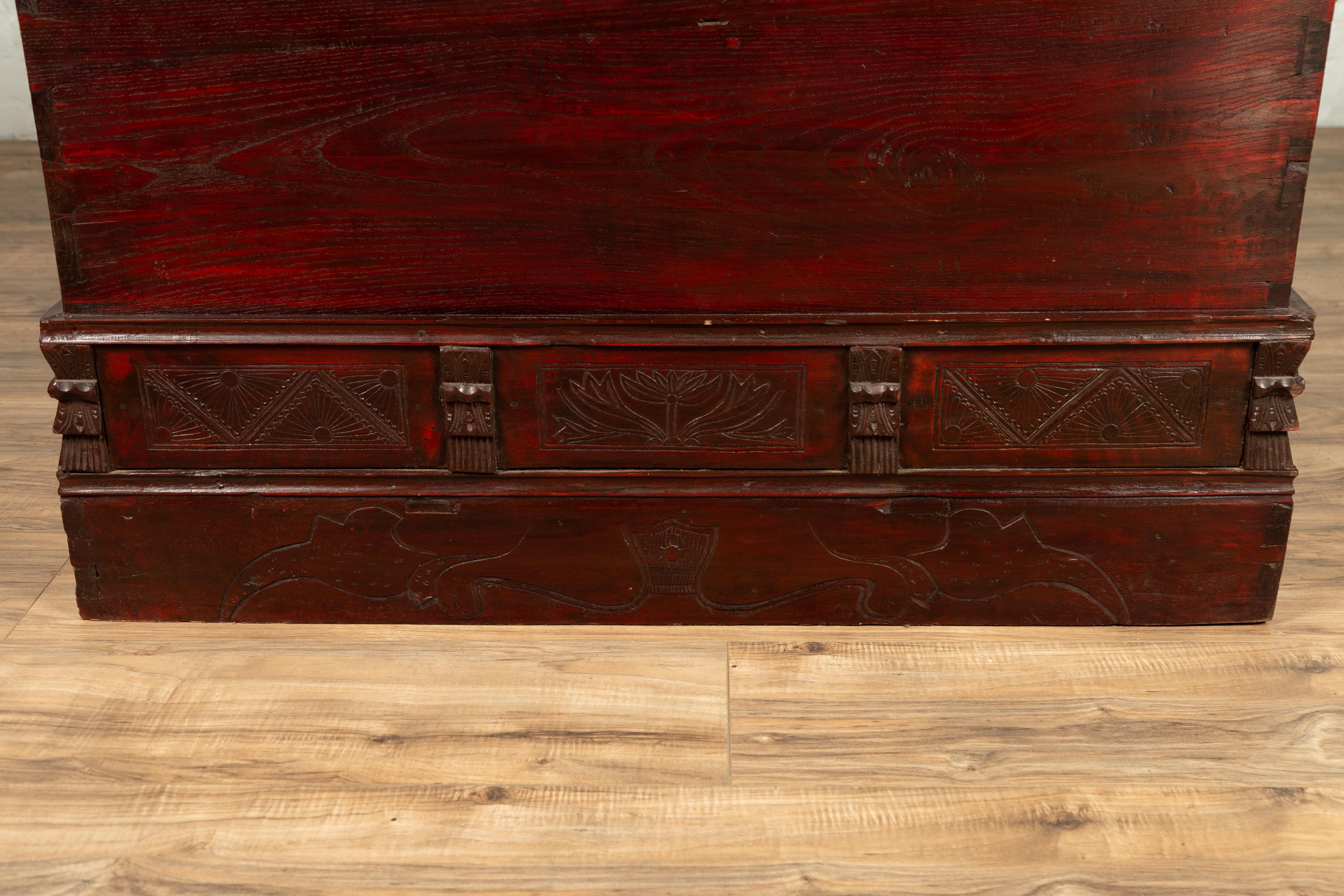Wood Chinese Antique Red Lacquered Trunk with Incised and Carved Motifs and Handles