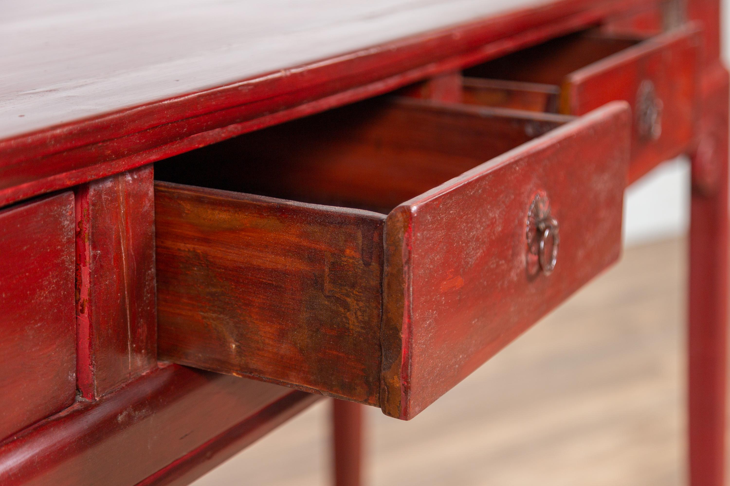 Chinese Antique Red Lacquered Wooden Desk with Four Drawers and Curling Scrolls 3