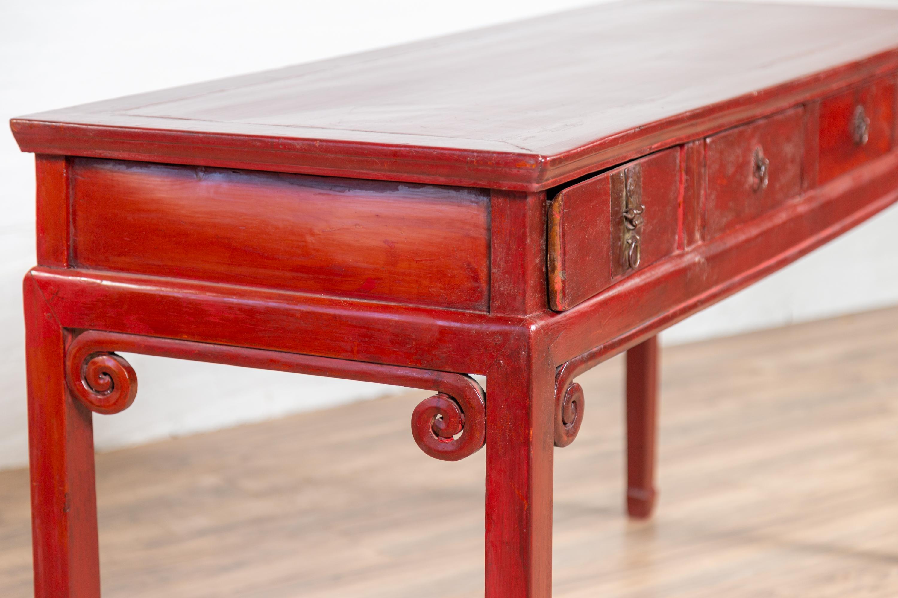 Chinese Antique Red Lacquered Wooden Desk with Four Drawers and Curling Scrolls 6