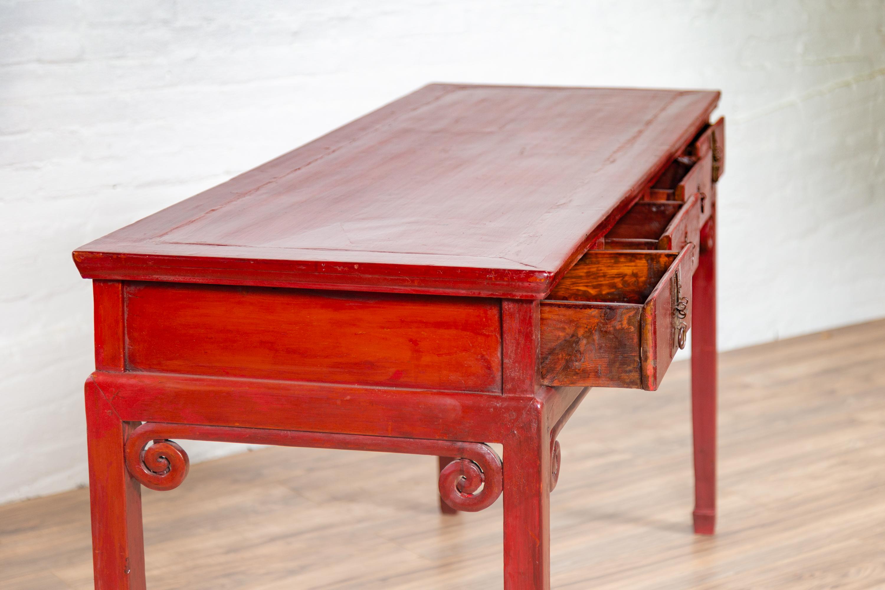 Chinese Antique Red Lacquered Wooden Desk with Four Drawers and Curling Scrolls 7