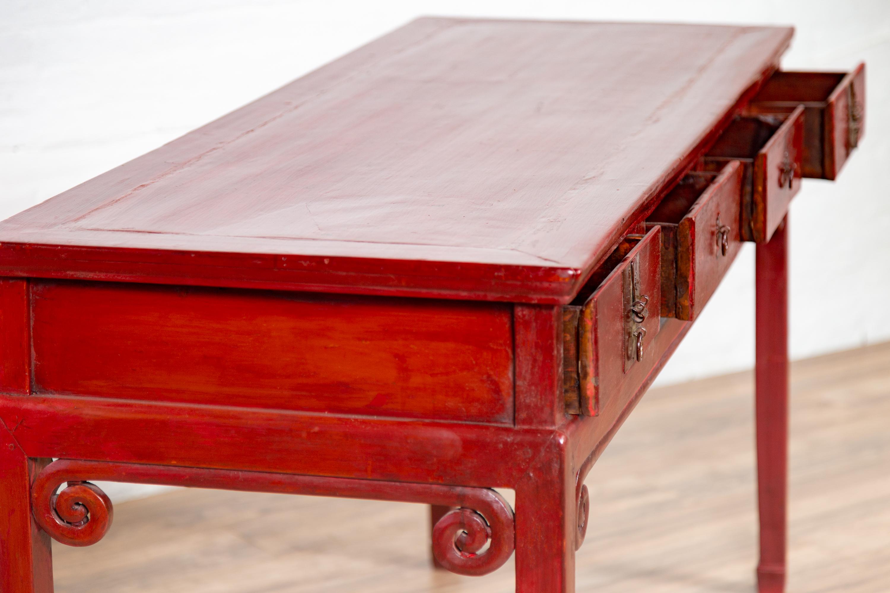 Chinese Antique Red Lacquered Wooden Desk with Four Drawers and Curling Scrolls 8