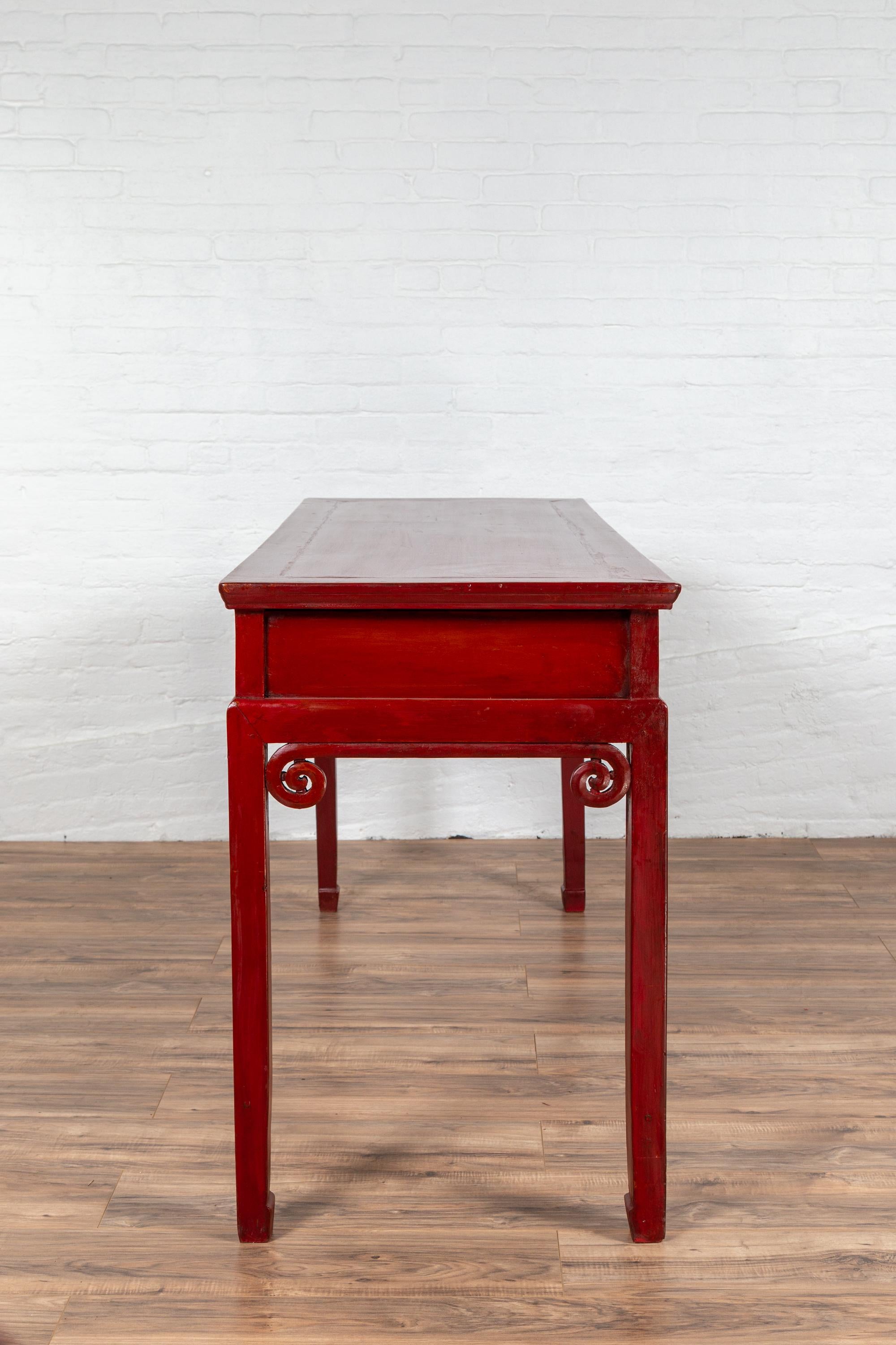 Chinese Antique Red Lacquered Wooden Desk with Four Drawers and Curling Scrolls 10