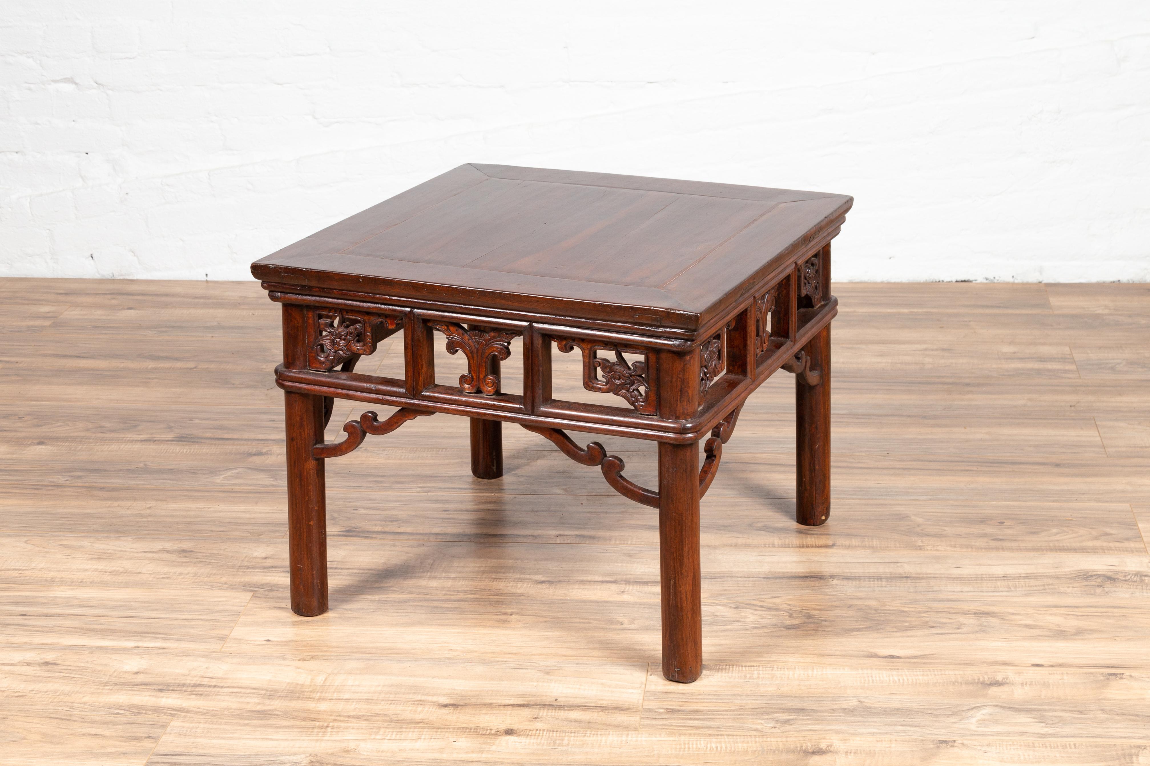 Chinese Antique Side Table with Open Fretwork Design and Dark Wood Patina For Sale 4