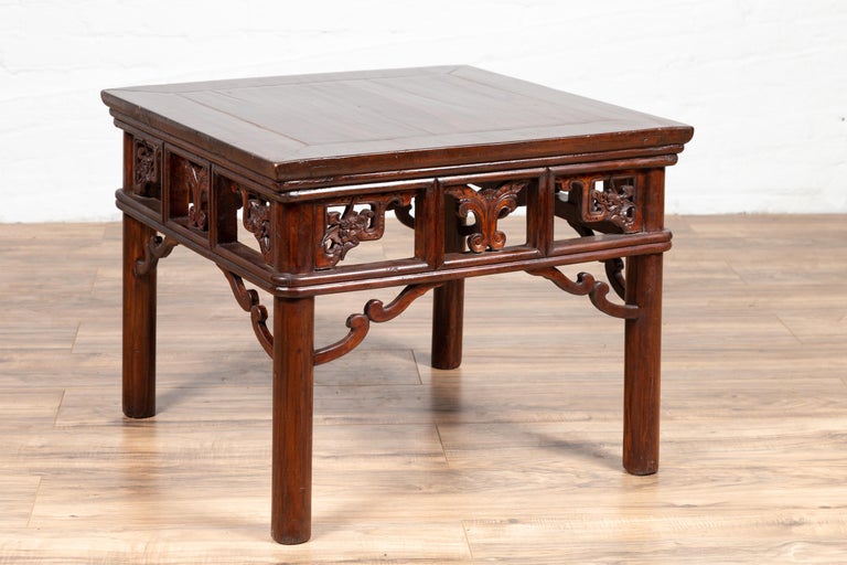 Chinese Antique Side Table With Open Fretwork Design And Dark Wood