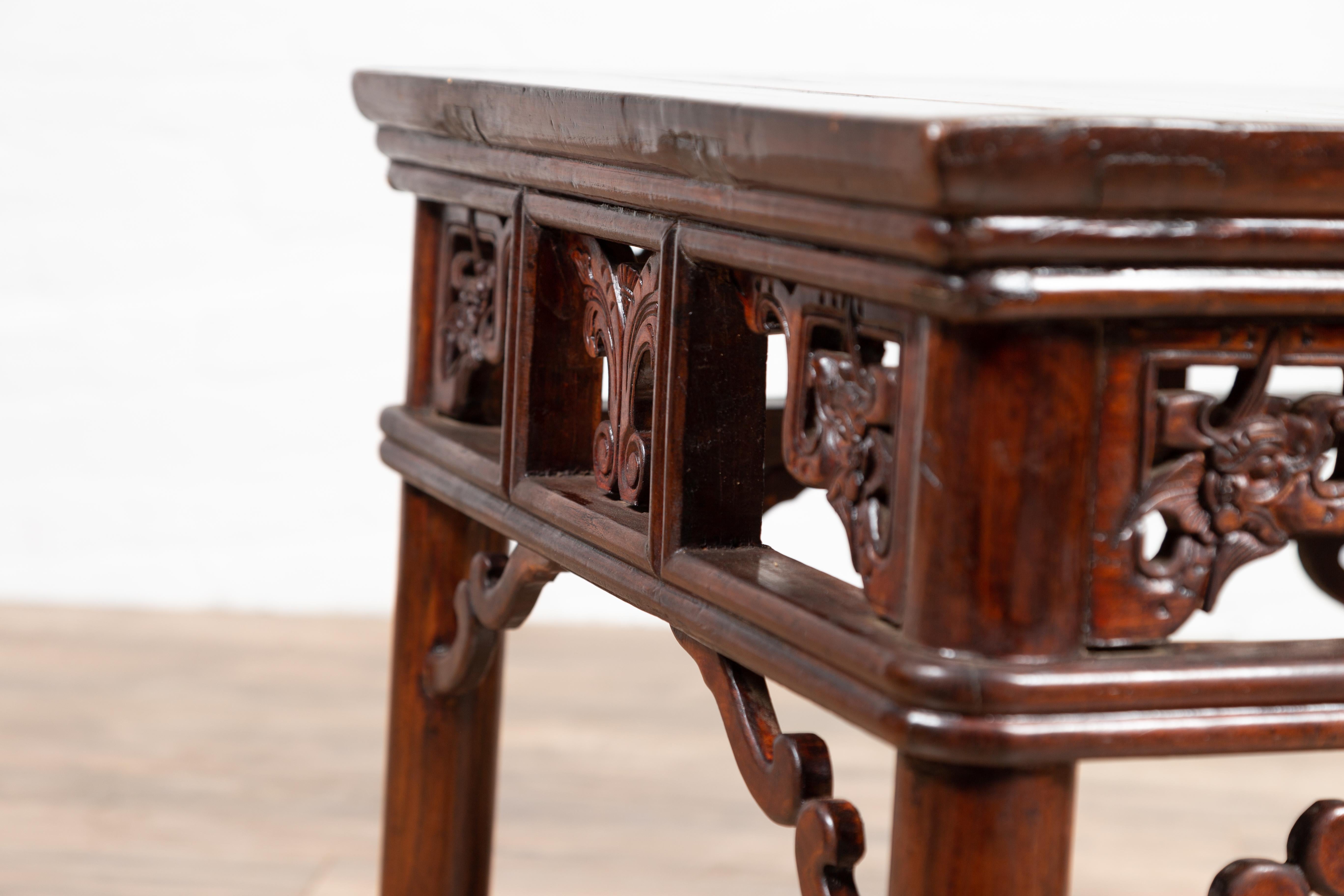 Chinese Antique Side Table with Open Fretwork Design and Dark Wood Patina For Sale 9
