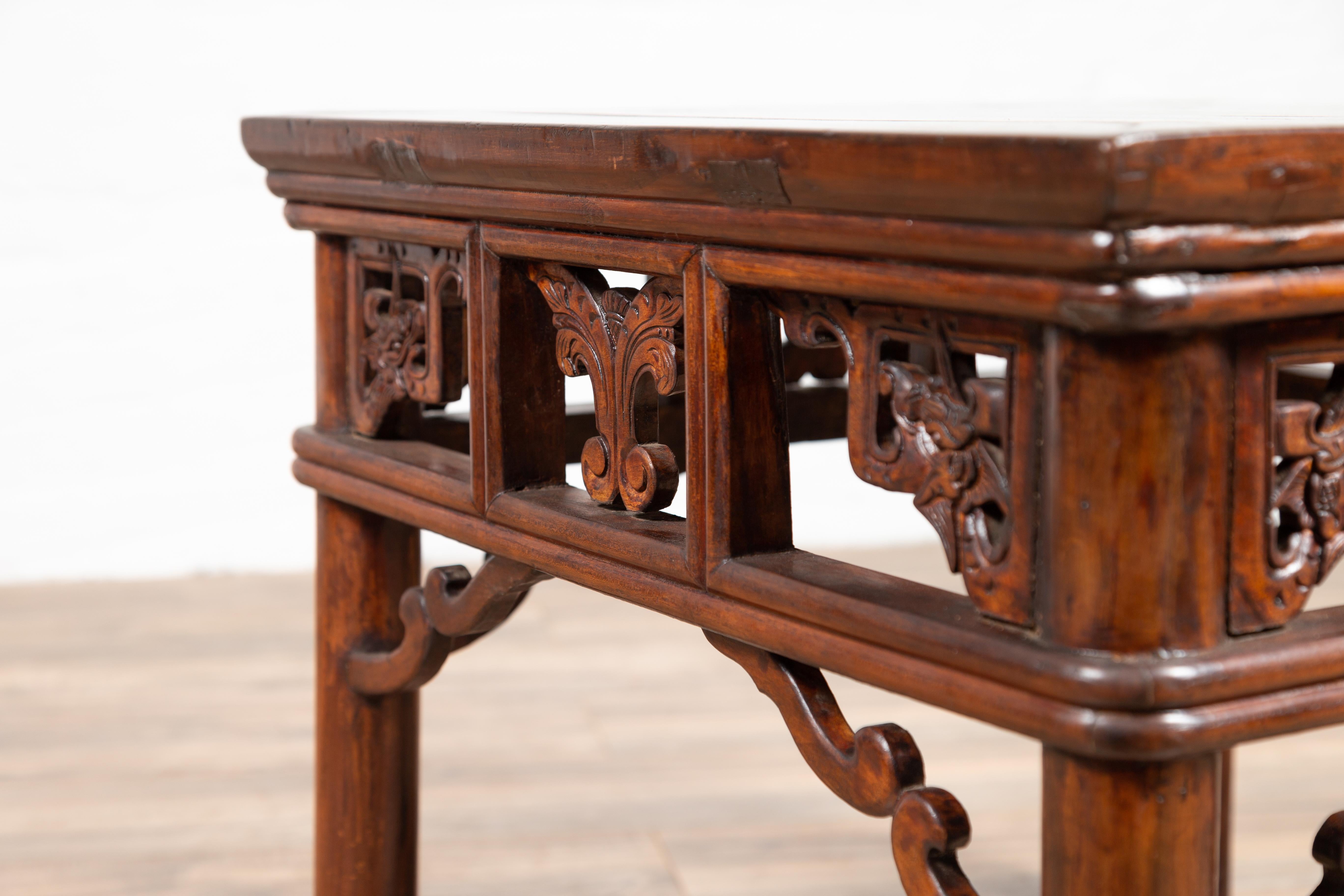 Chinese Antique Side Table with Open Fretwork Design and Dark Wood Patina For Sale 11