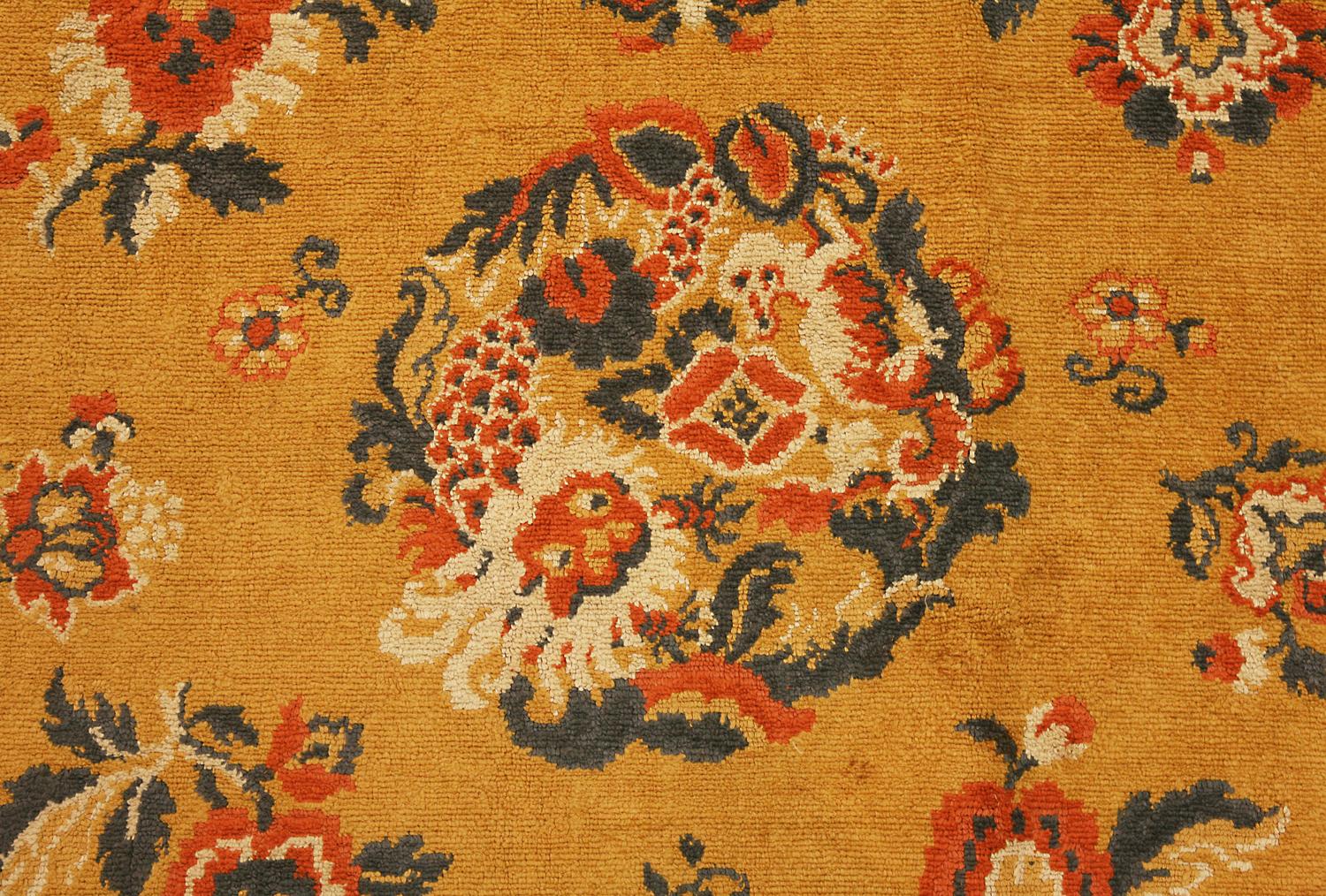 This is a semi-antique Chinese velvet textile woven during the first half of the 20th century circa 
1940s. This textile has all over field design is made up of traditional Chinese motifs that consist 
of blossoming tree branches, different types