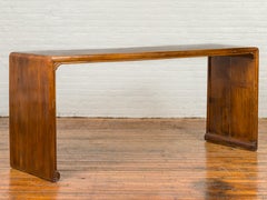 Chinese Antique Waterfall Console Table with Scrolling Feet and Warm Patina