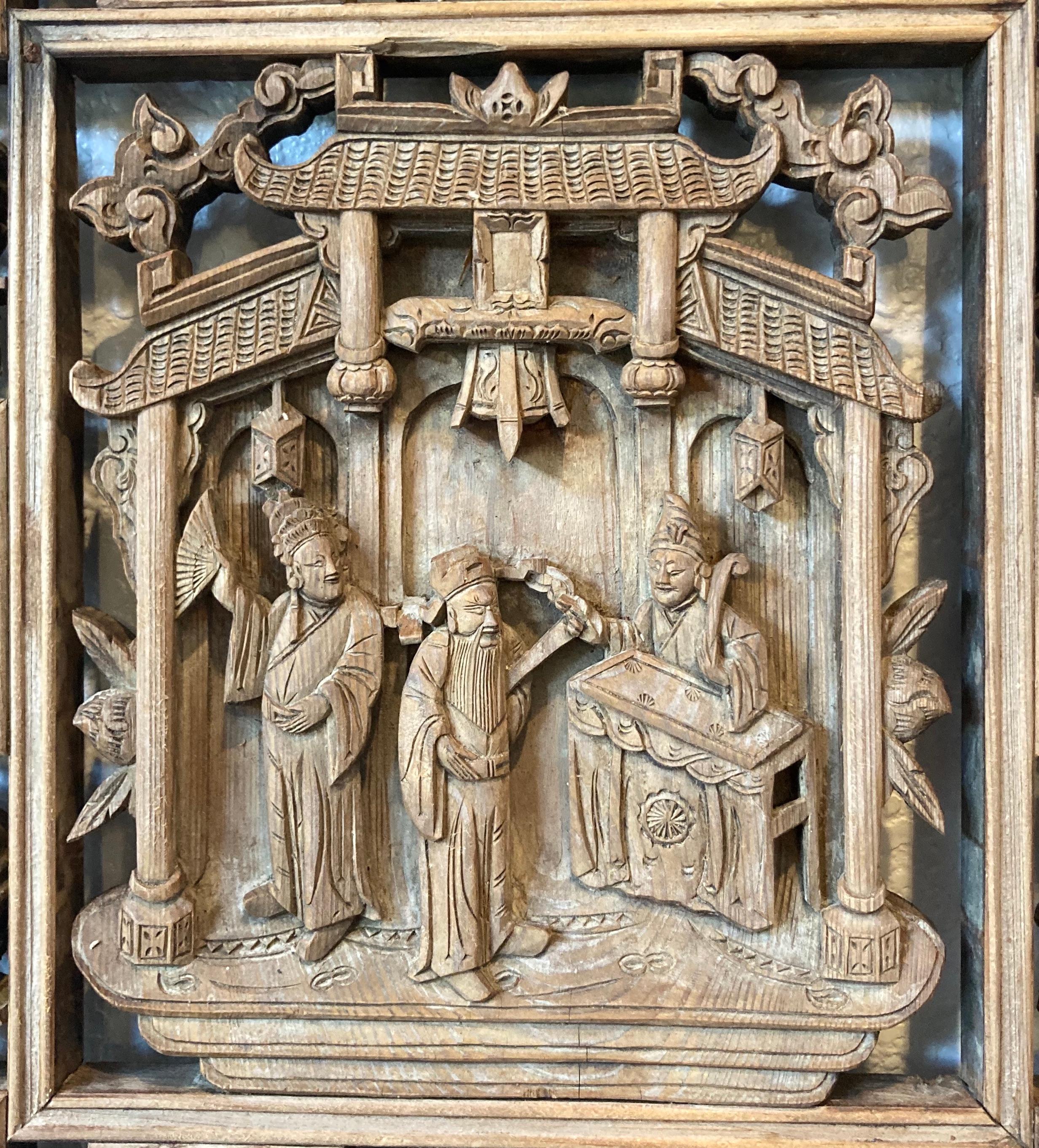 Lattice panels with mitered mortise and tenon joints. Panels include square center carving with personage motif, and multiple small carved objects with bird, beast and floral motifs.