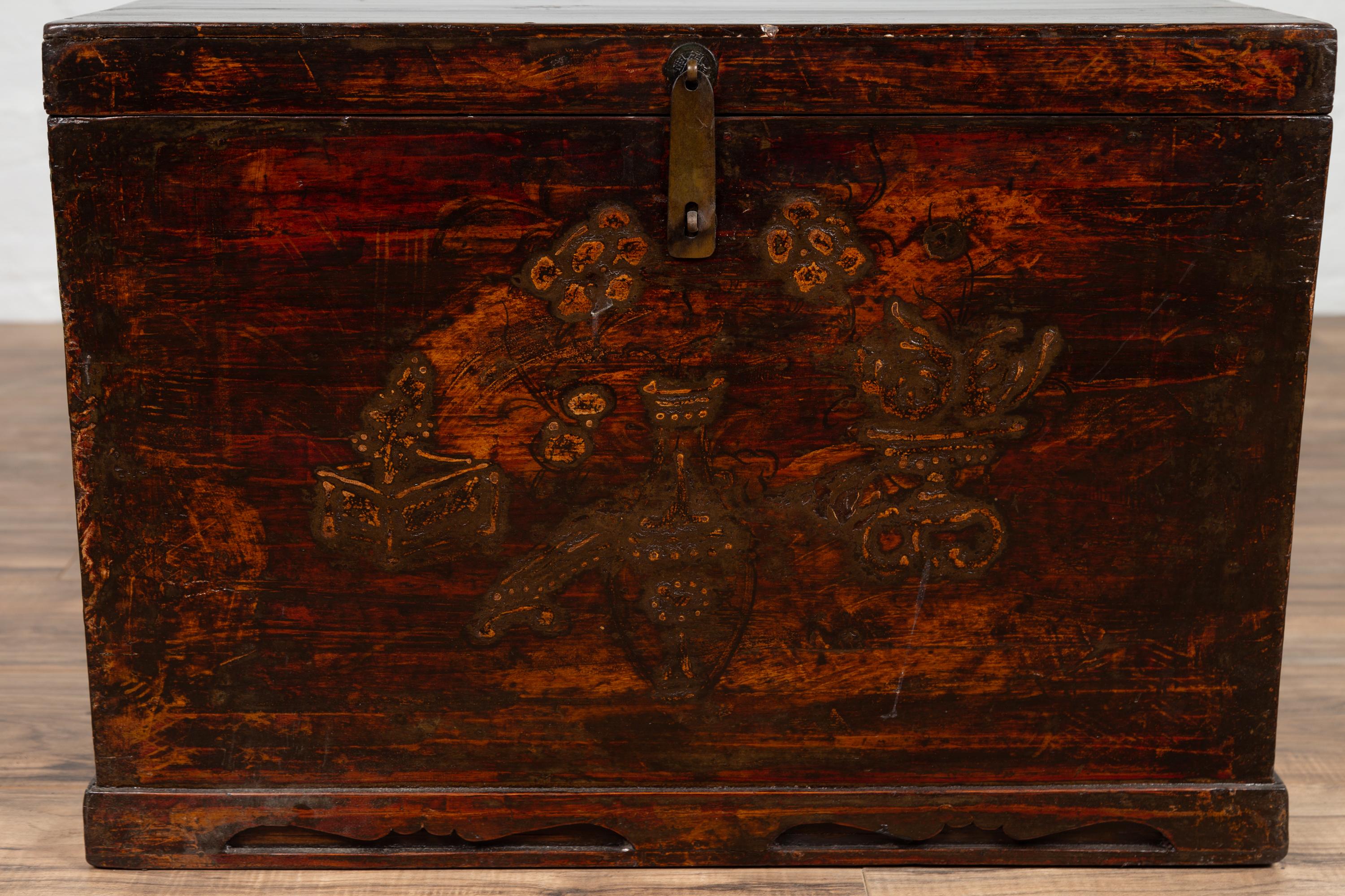 20th Century Chinese Antique Wooden Blanket Chest with Raised Decor and Polychrome Patina