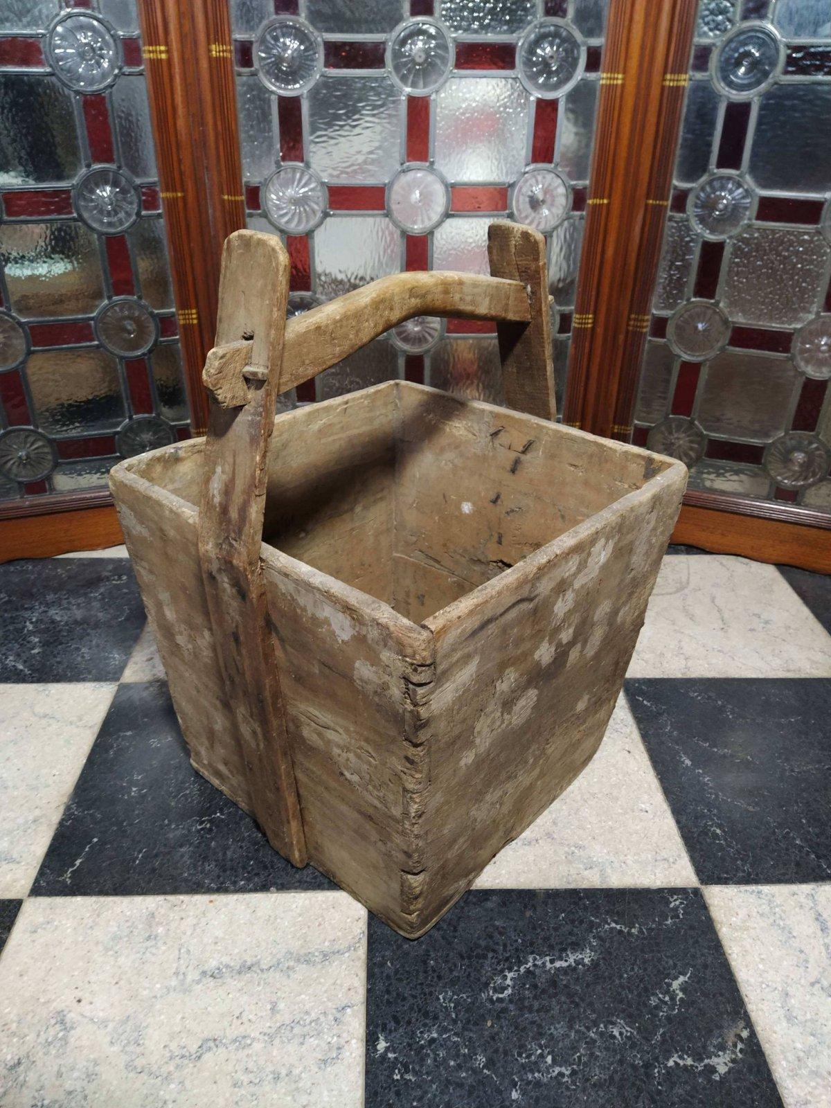 Chinese Antique wooden rice bucket with through pegged joints to the handle uniting the carrying straps which were bent into place when the wood was green when inserting the shaped handle and peg joints.