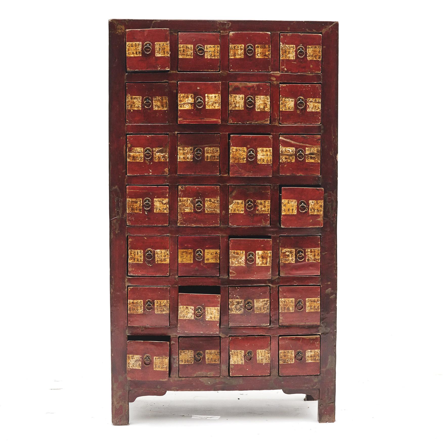 Chinese apothecary medicine chest dating to circa 1840-1850. From the Shanxi province, China.
Original lacquer. Red lacquer on front, black sides.
28 drawers with remains of the descriptions with the name of different medicinal
