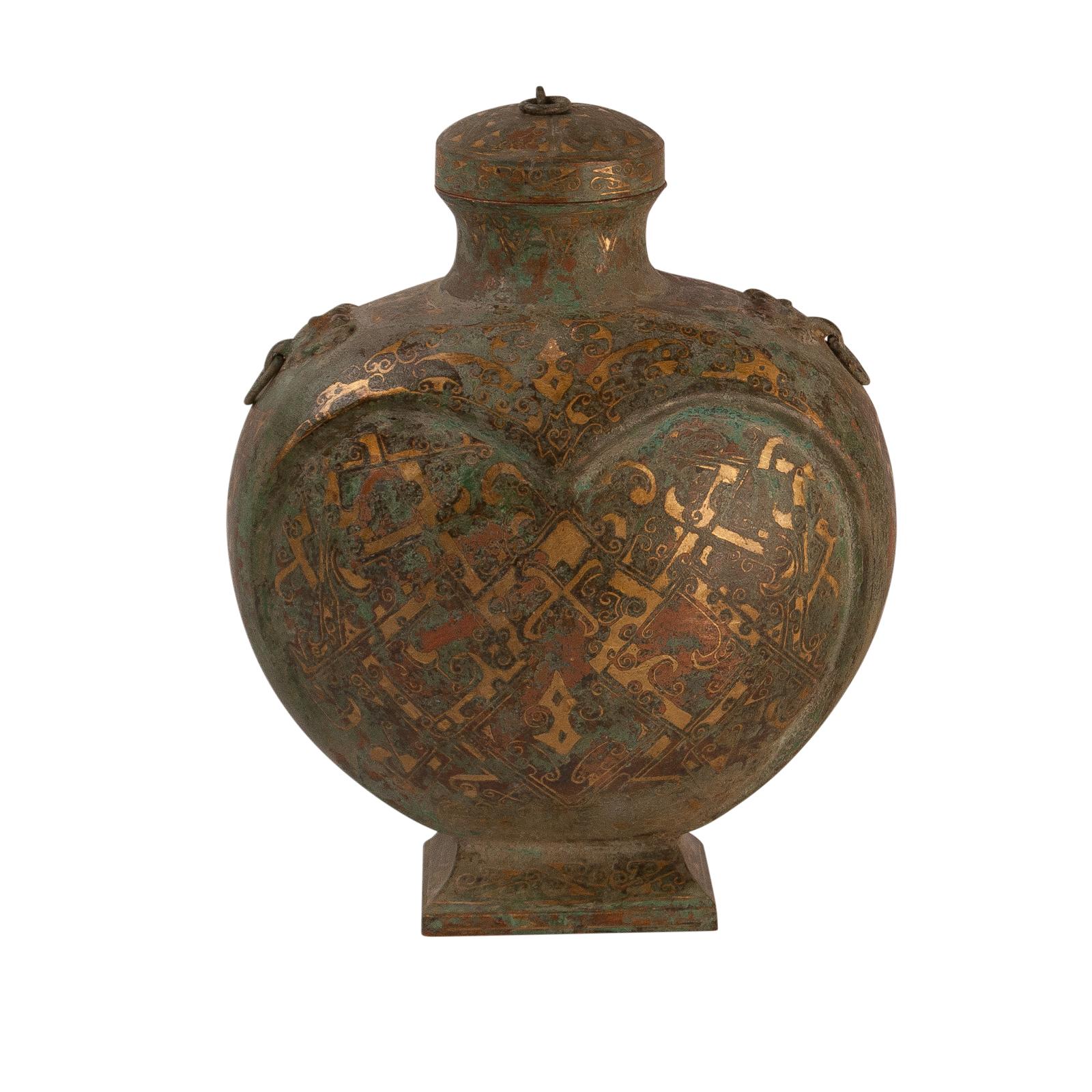An Archaic Shang Dynasty style bronze flask inlaid with gold in a geometric pattern, China, Early to mid 20th century.  
