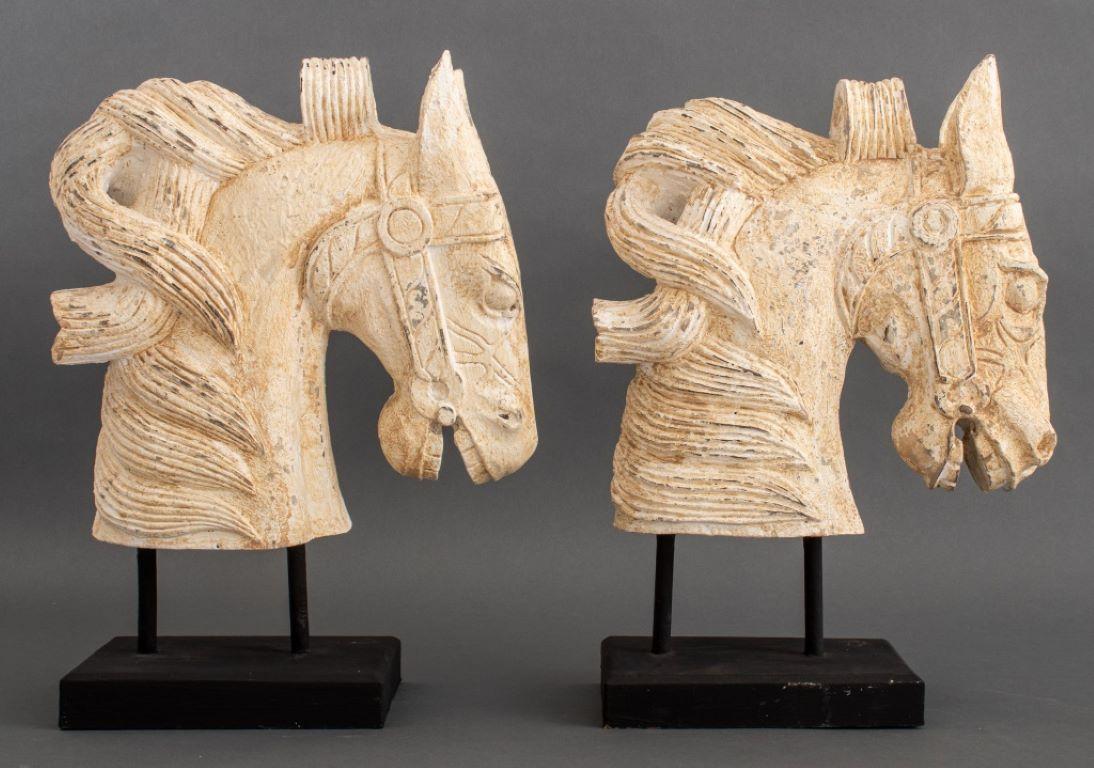 Pair of Chinese Archaic Style White Painted Wood Horse Bust Sculptures, on black painted wood stands. Each overall: 17