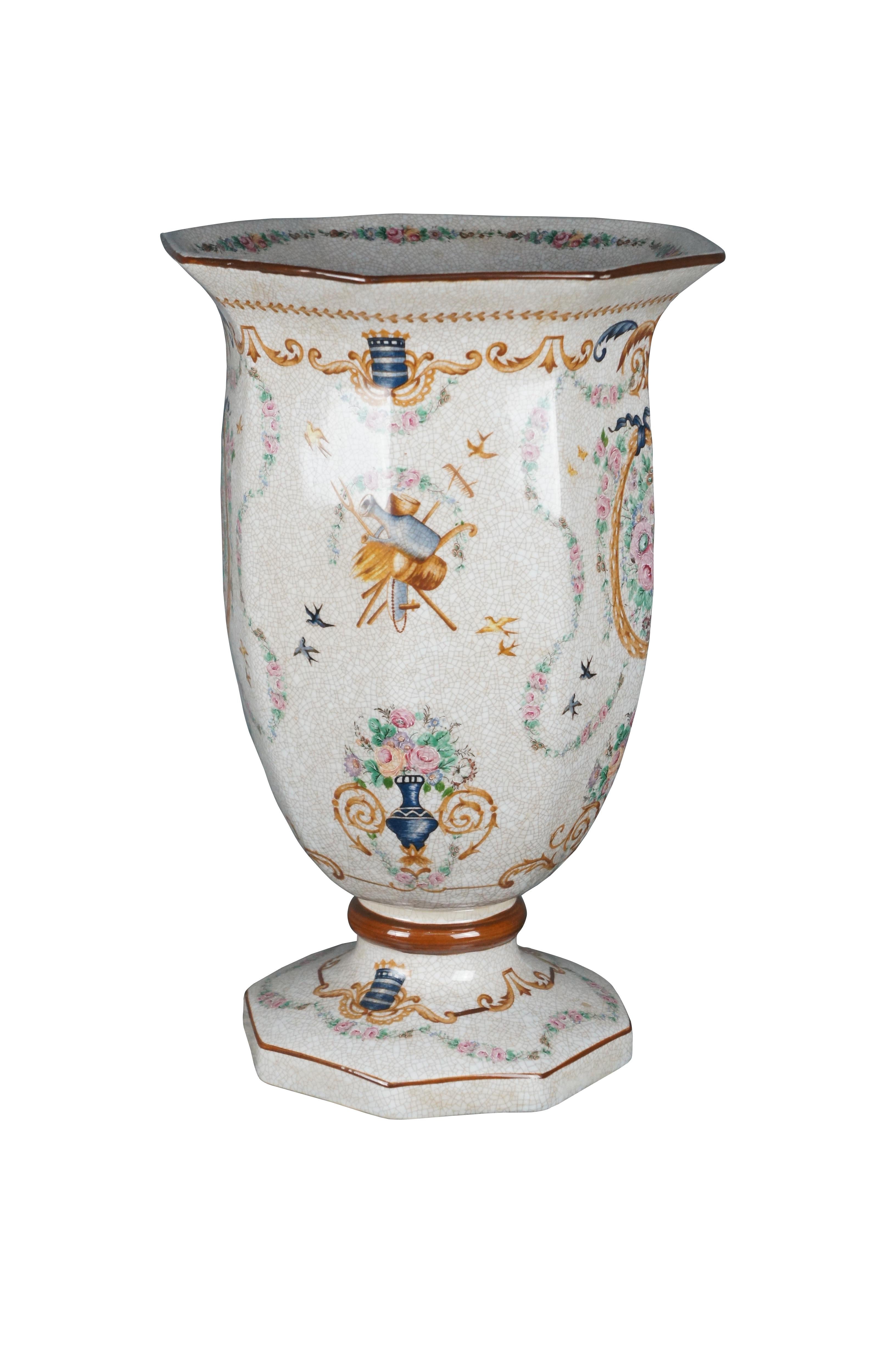 Chinese porcelain footed Armorial vase. Features a polychrome finish over a crackle glaze with neoclassical and floral motifs.

Dimensions:
10