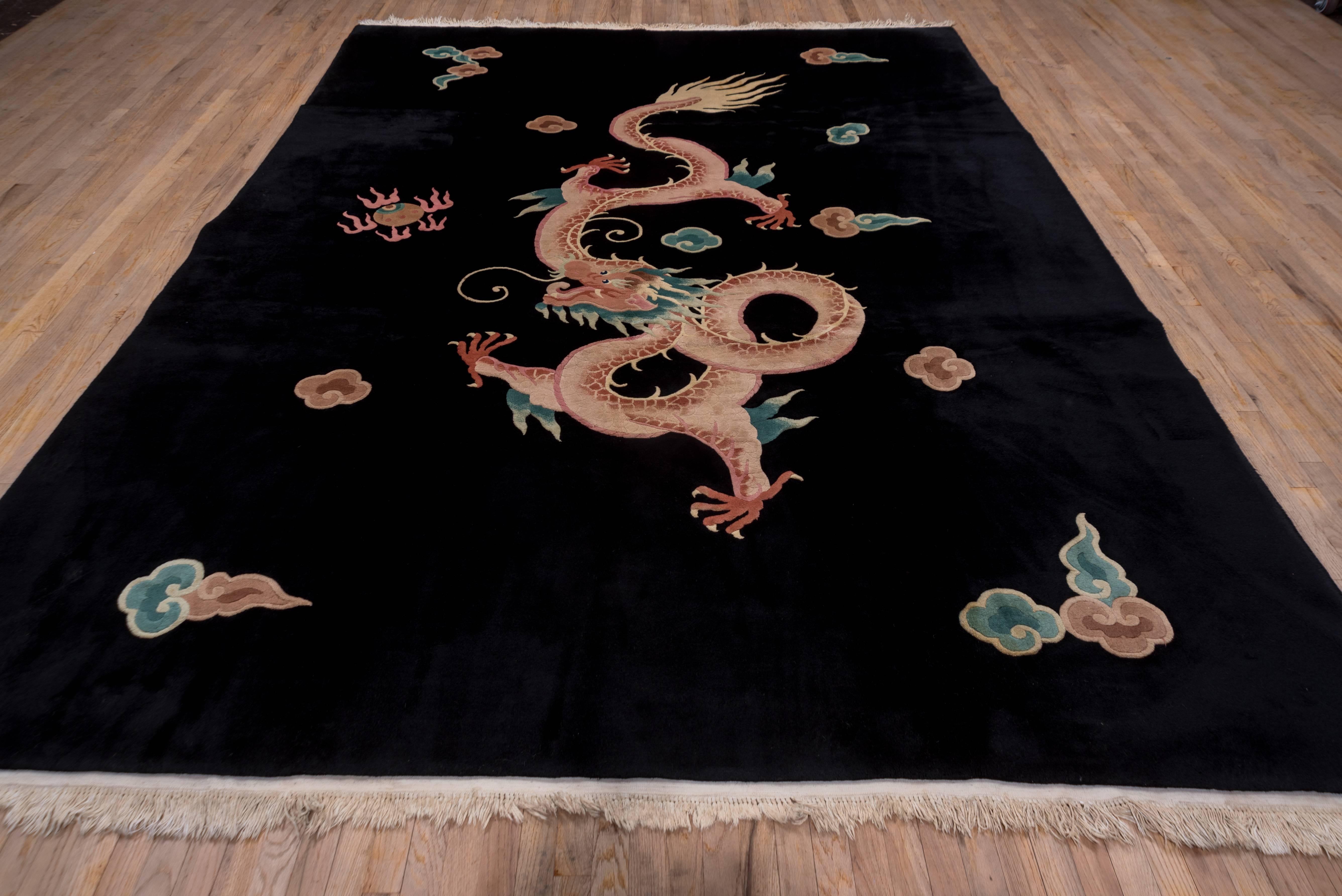 Exuberance, exoticism, wealth, abundance, these are a few of the adjectives that come to mind when thinking of the decorative arts that emerged from the Art Deco period during the 1920s. This wildly exotic Chinese carpet from the 1920s is no