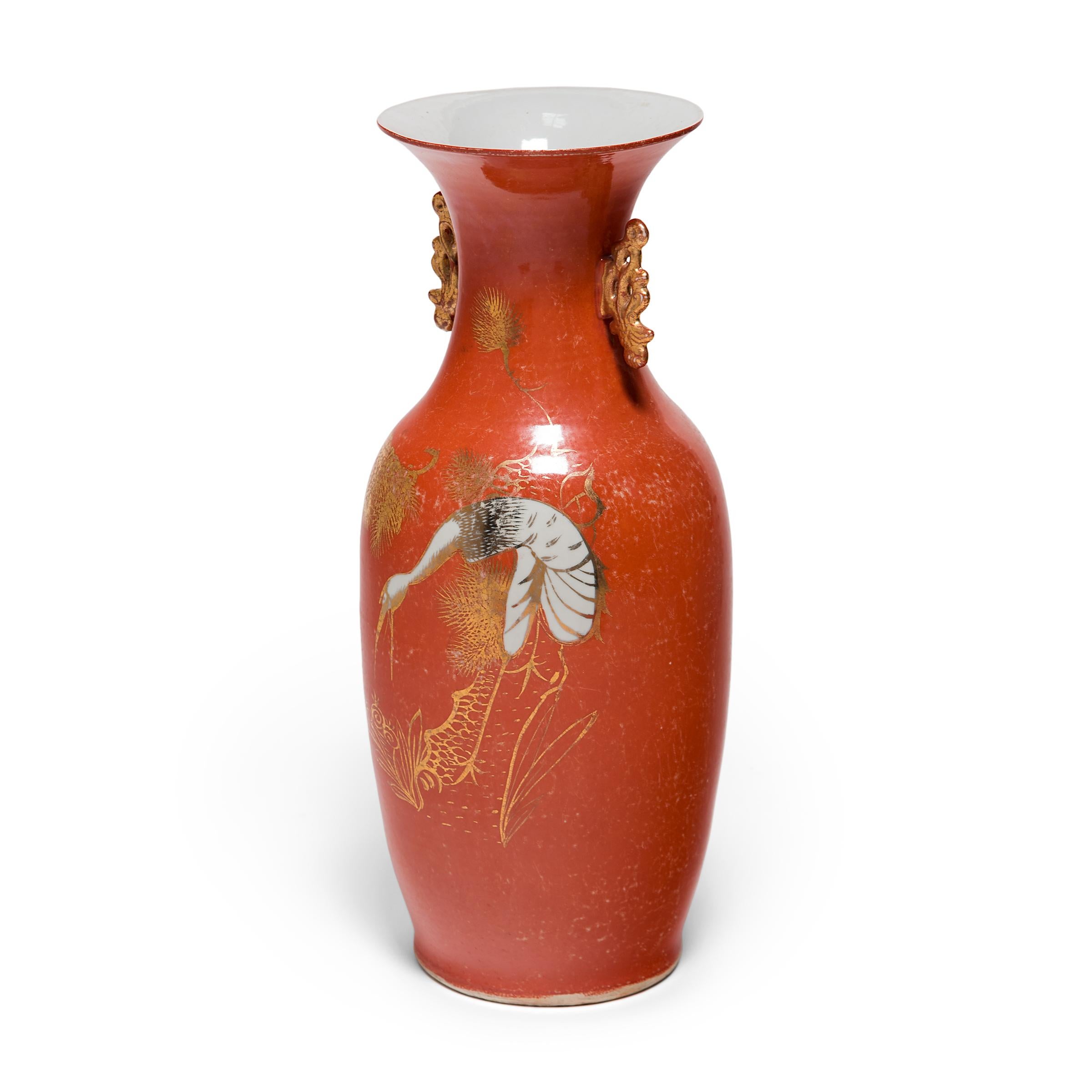 Drawing on the enduring phoenix tail form that dates to China’s Bronze Age, this porcelain vase from the 1920s exhibits the sinuous lines and gilded refinement that helped to define the Art Deco style of the early 20th century. Glazed rich