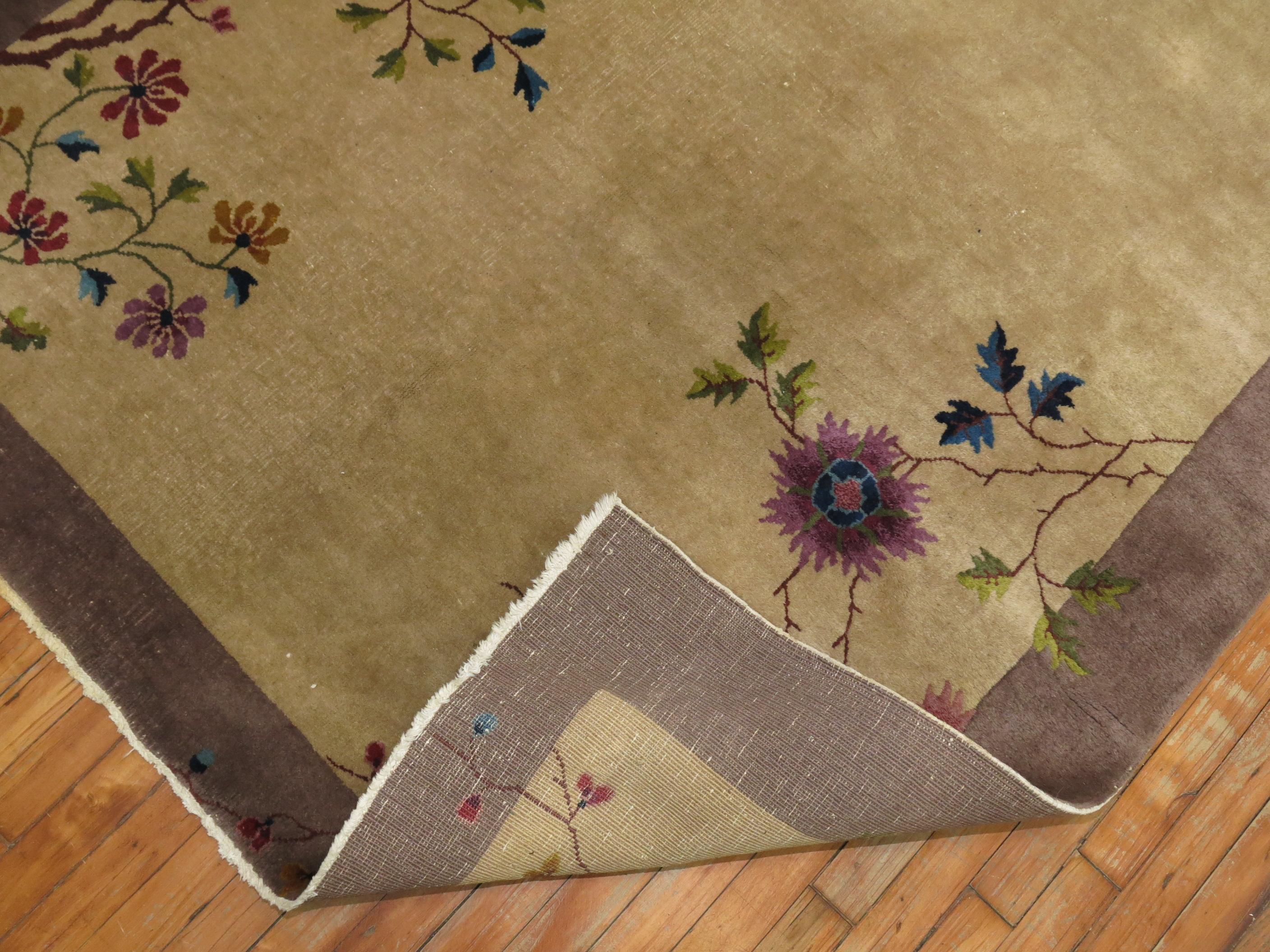 An extremely rare gallery size Art Deco rug in taupes, browns, green and purples.