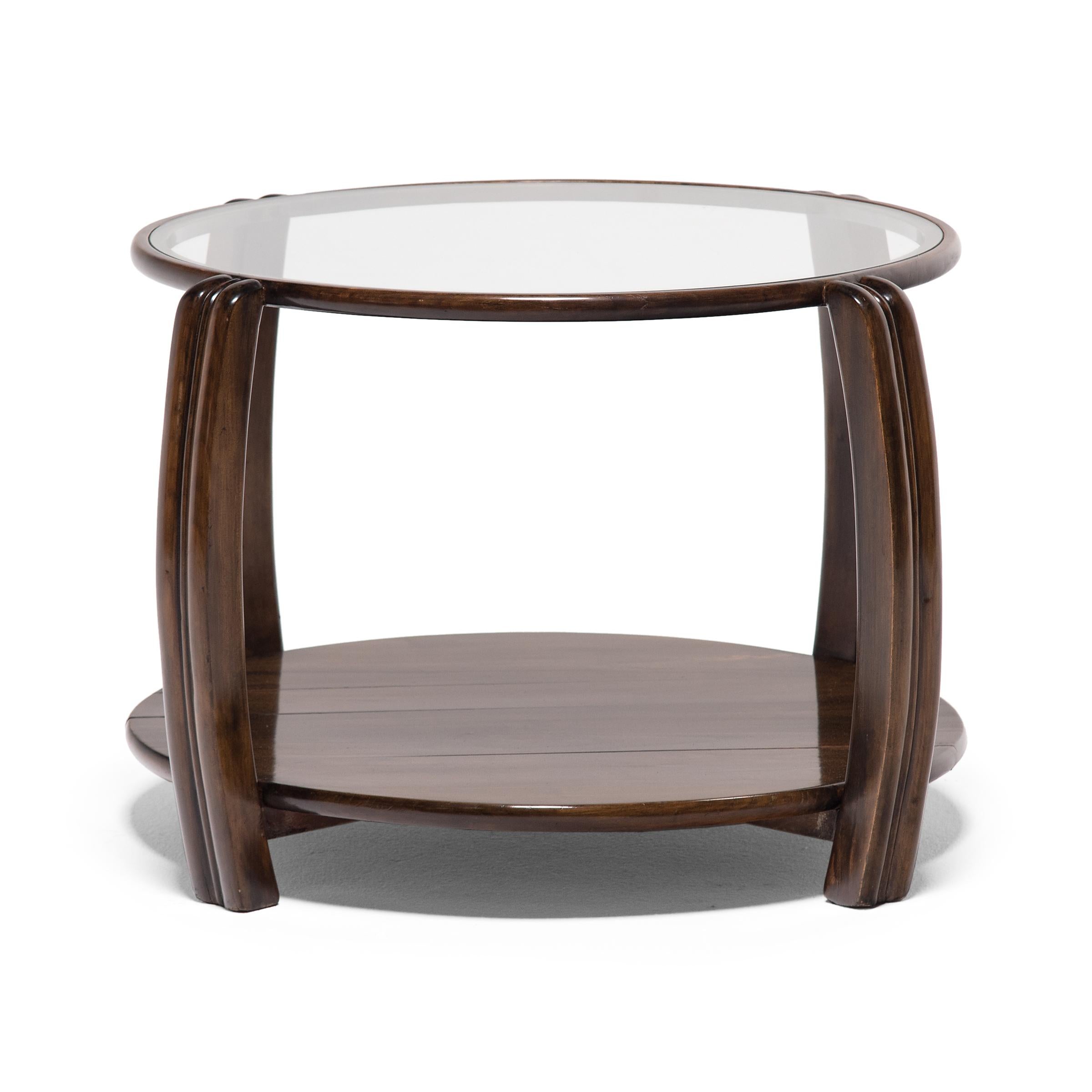 When the Art Deco movement reached major Chinese cities like Tianjin and Shanghai, the design aesthetic that emerged was the perfect intersection of European modernism and Ming-dynasty refinement. This round side table is a product of the era,