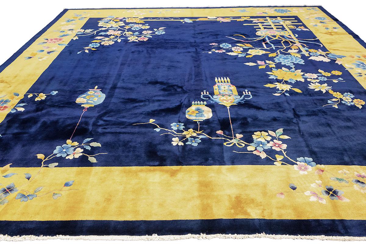 Chinese Art Deco Rug By Walter Nichols
This exquisite Walter Nichols Chinese Art Deco rug is a stunning example of early 20th-century design blended with traditional Chinese artistic themes. Known for his exceptional craftsmanship and vibrant color