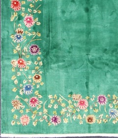 Chinese Art Deco Rug with Empty Green Field and Colorful, Vining, Floral Border