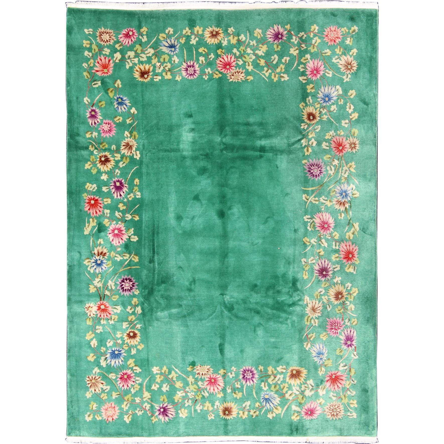 Chinese Art Deco Rug with Empty Green Field and Colorful, Vining, Floral Border