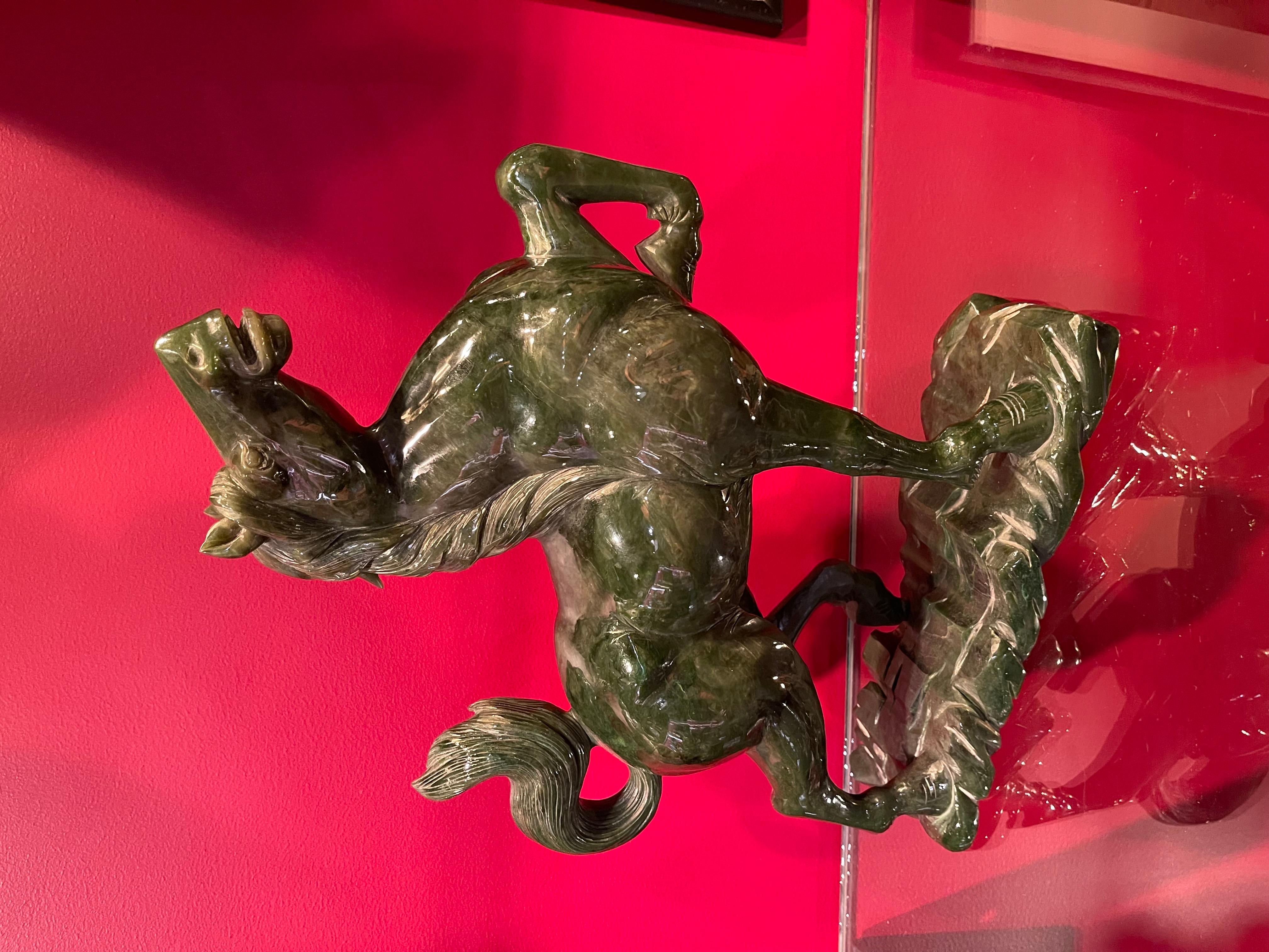 Chinese Art Deco Spinach-Green Jade Horse, Ca. 1920       
            
DIMENSIONS:
Height: 13.5 inches
Length: 11.5 inches
Depth: 4.5 inches
