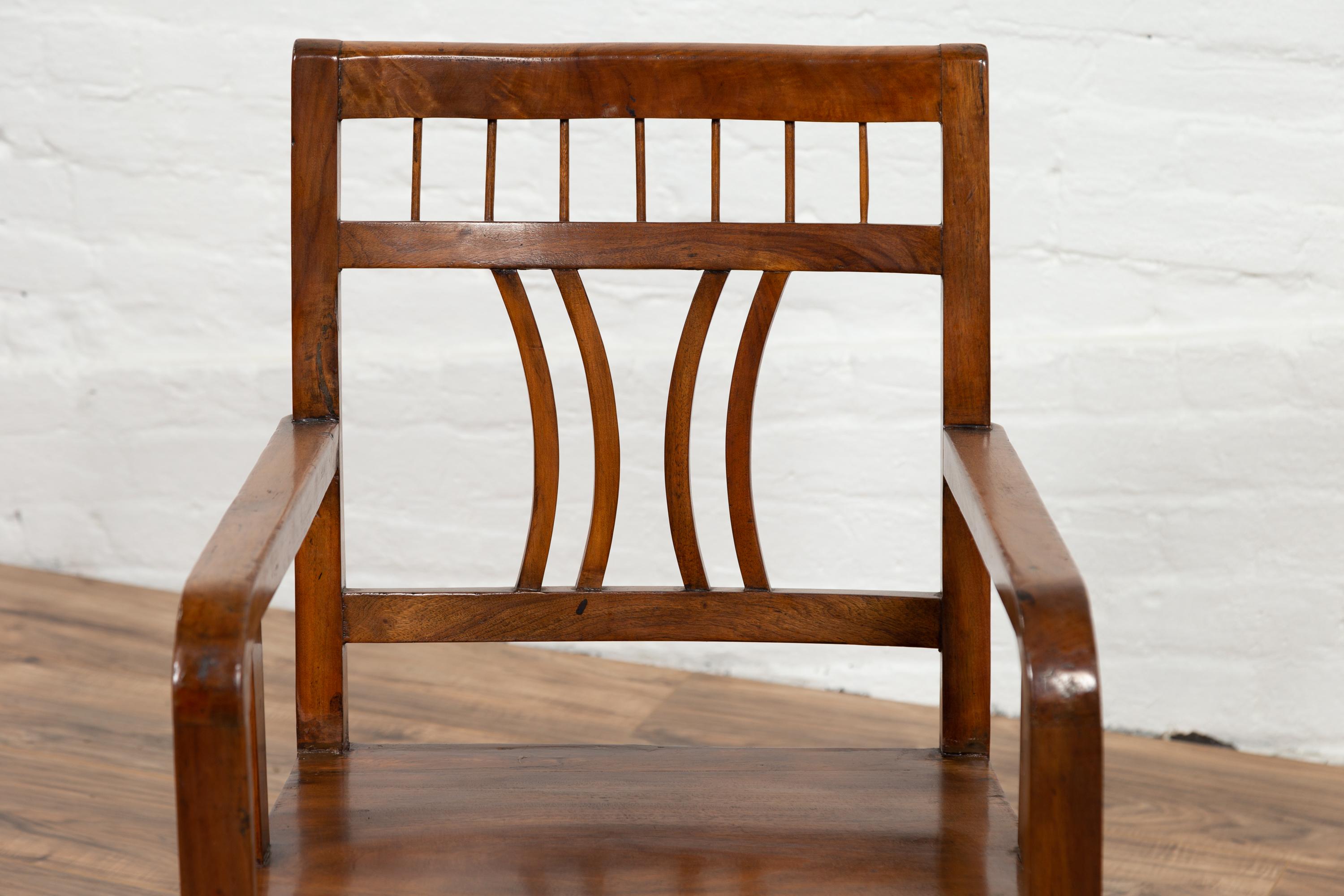 Carved Art Deco Style 1950s Elmwood Armchair with Pierced Back and Curving Arms For Sale