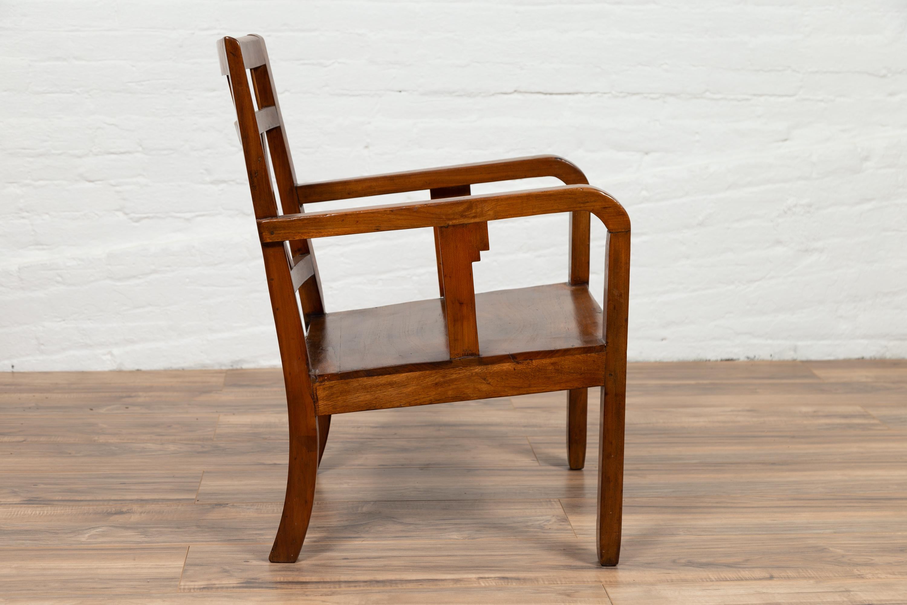 20th Century Art Deco Style 1950s Elmwood Armchair with Pierced Back and Curving Arms For Sale