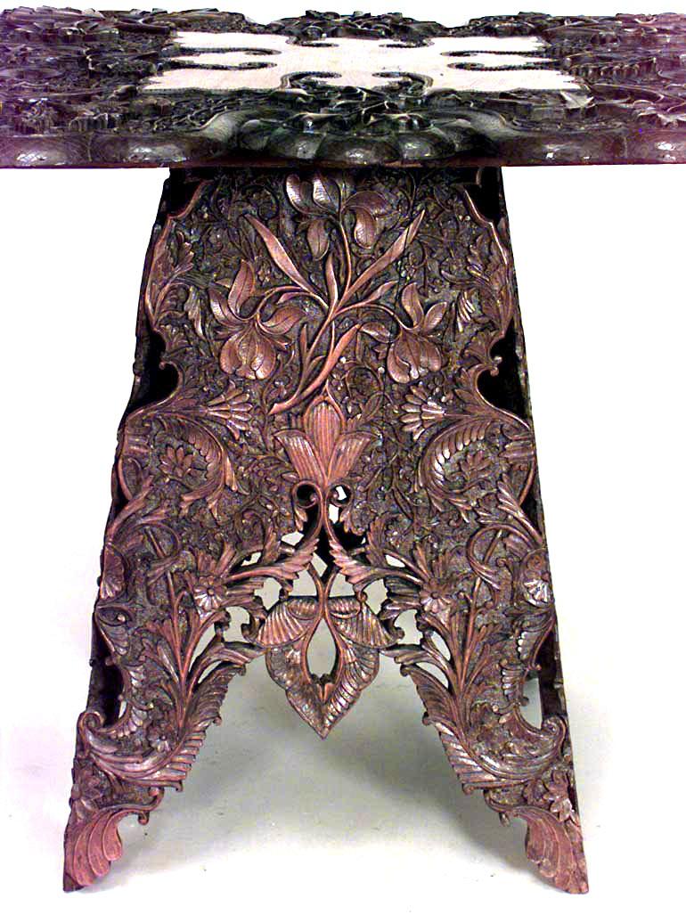Chinese Art Nouveau-style (19th Century) walnut floral carved table with shaped square top.
