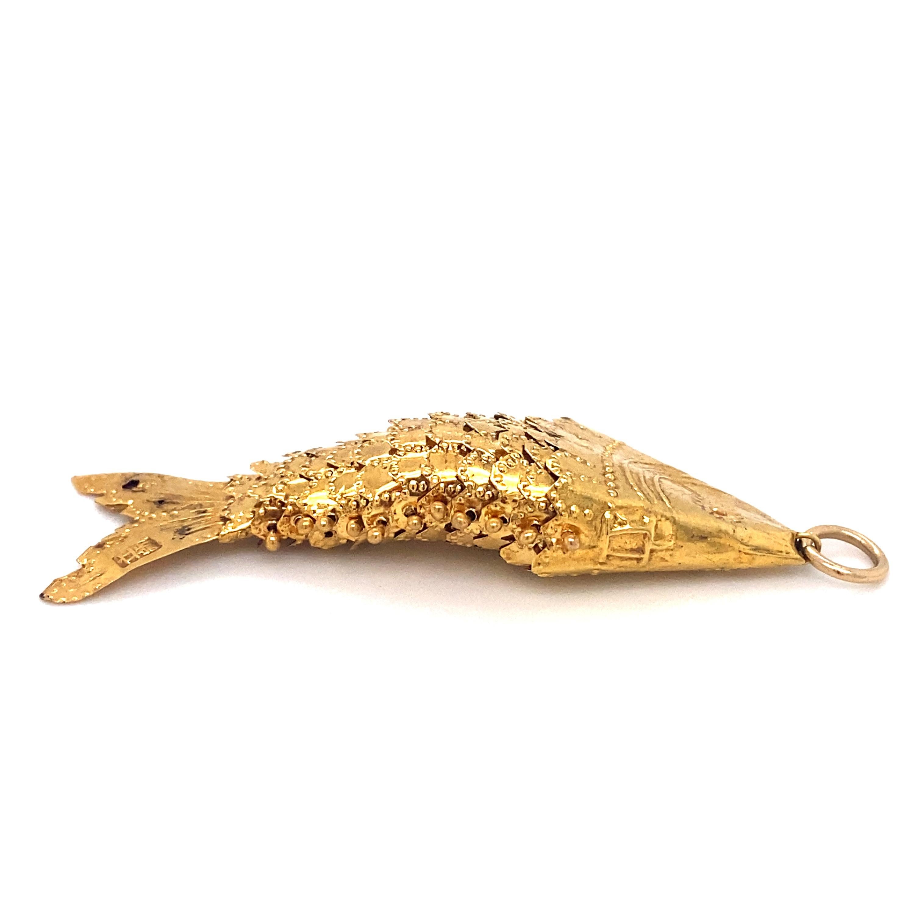 gold articulated fish pendant