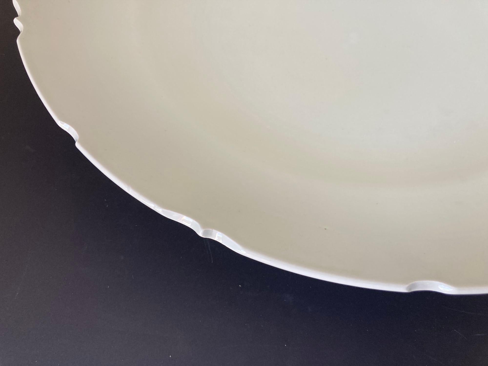 Asian Chinese White Ceramic Platter Scalloped Rim Huge Heavy Dep Bowl 24 in. Diameter.
Very large white Asian Chinese ceramic plate or bowl.
Chinese Qing style white glazed ceramic bowl.
Oversized white ceramic platter bowl, great to use for indoor