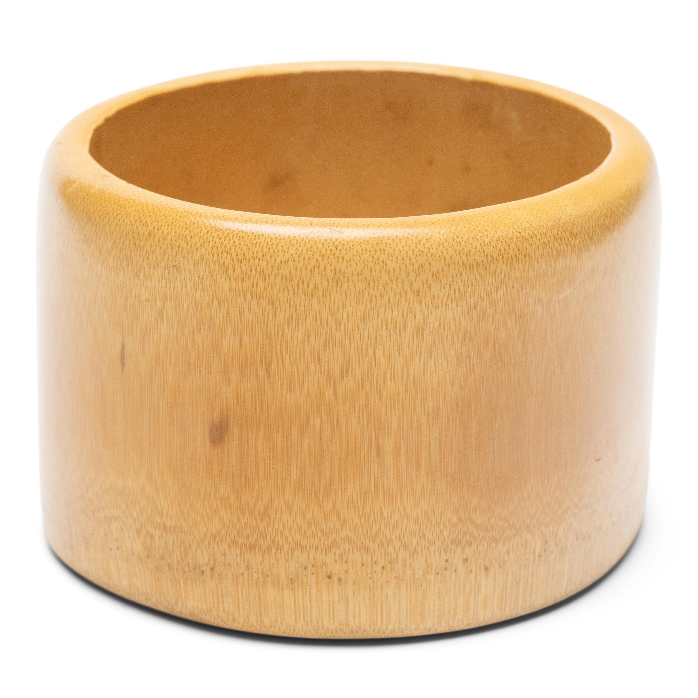 Placed alongside the Four Treasures of the scholar - paper, brush, ink, and inkstone - the brush pot was an essential fixture of the traditional Chinese scholar's studio, used to hold select brushes for calligraphy and ink painting. This