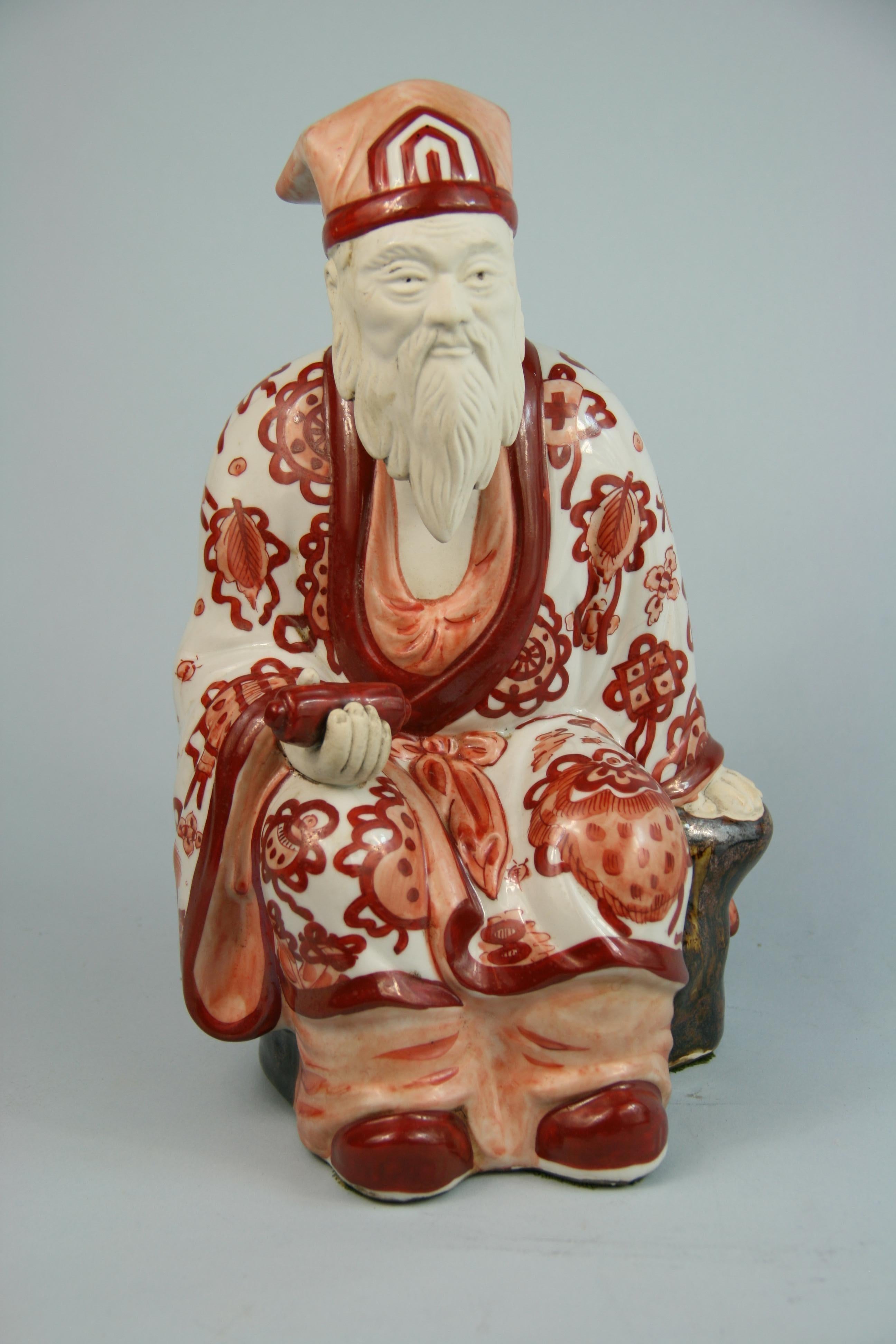 3-552 hand painted bisque Chinese ceramic sculpture.