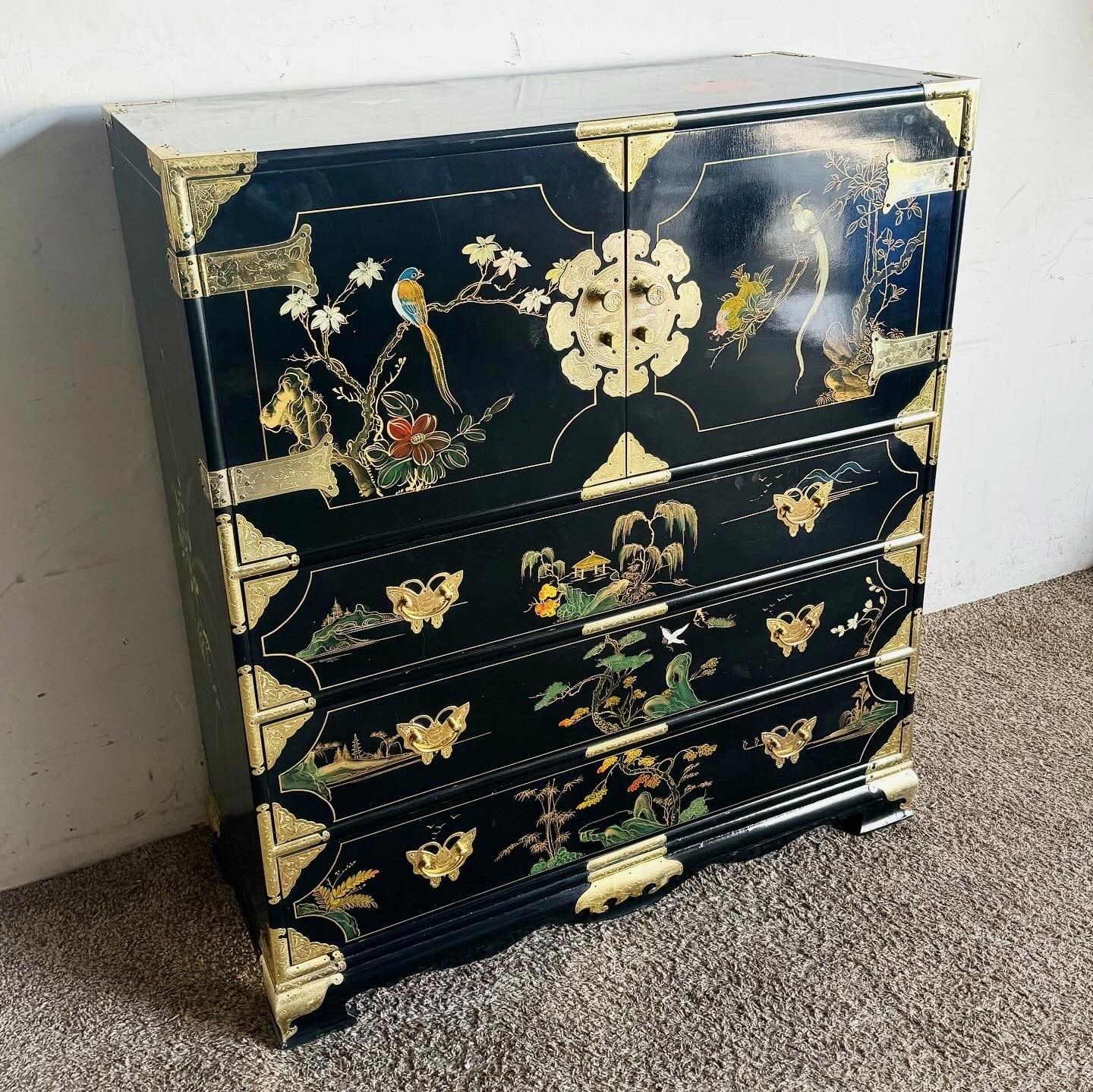 Elevate your interior with the exquisite charm of this Chinese Hand-Painted Black and Gold Armoire. Featuring intricate gold motifs against a sleek black lacquered finish, this versatile piece offers ample storage and timeless elegance. Perfect for