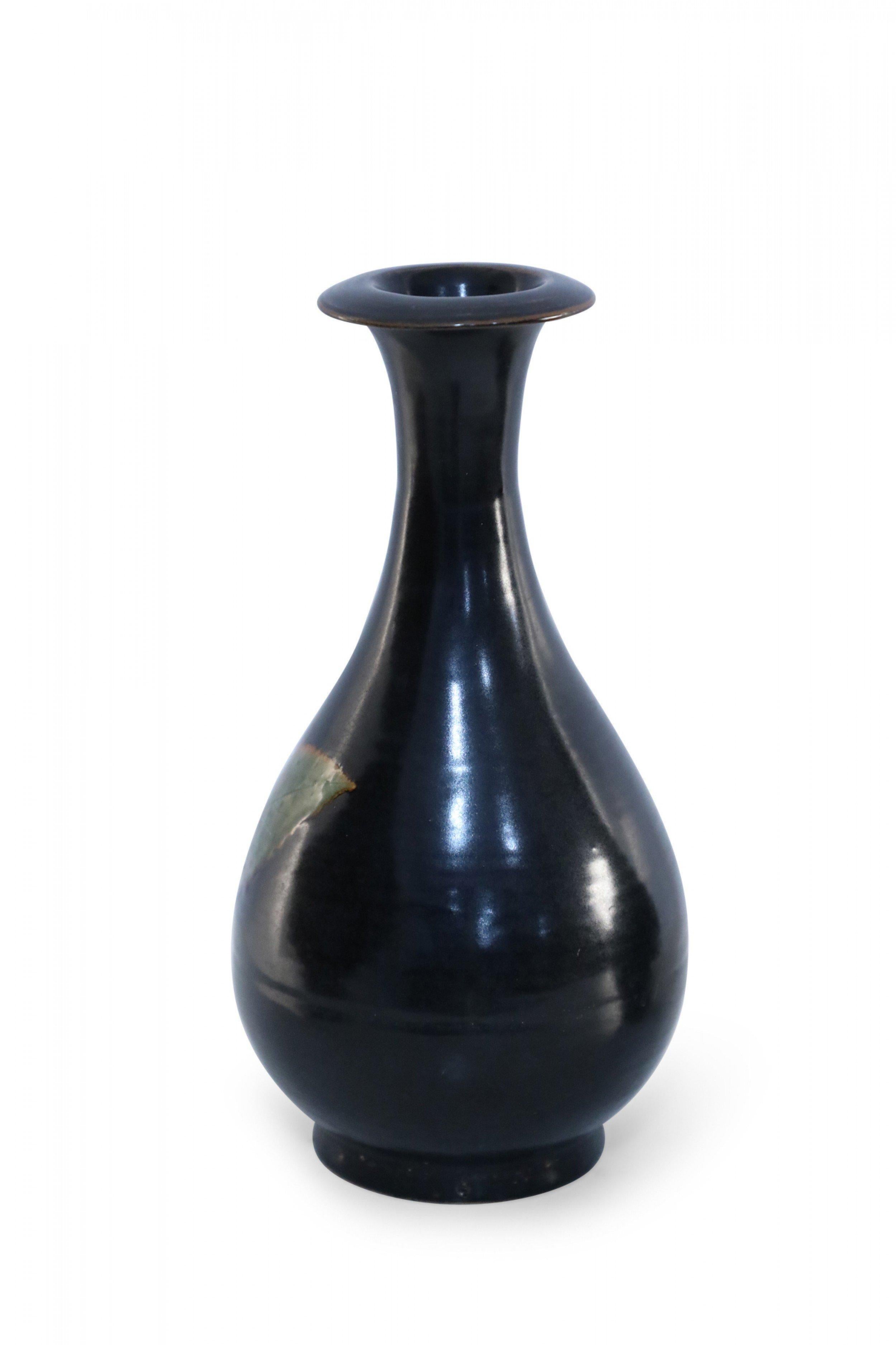 Antique Chinese (17th Century-style) black glazed ceramic pear-shaped vase decorated with a green leaf on the front and back.
   