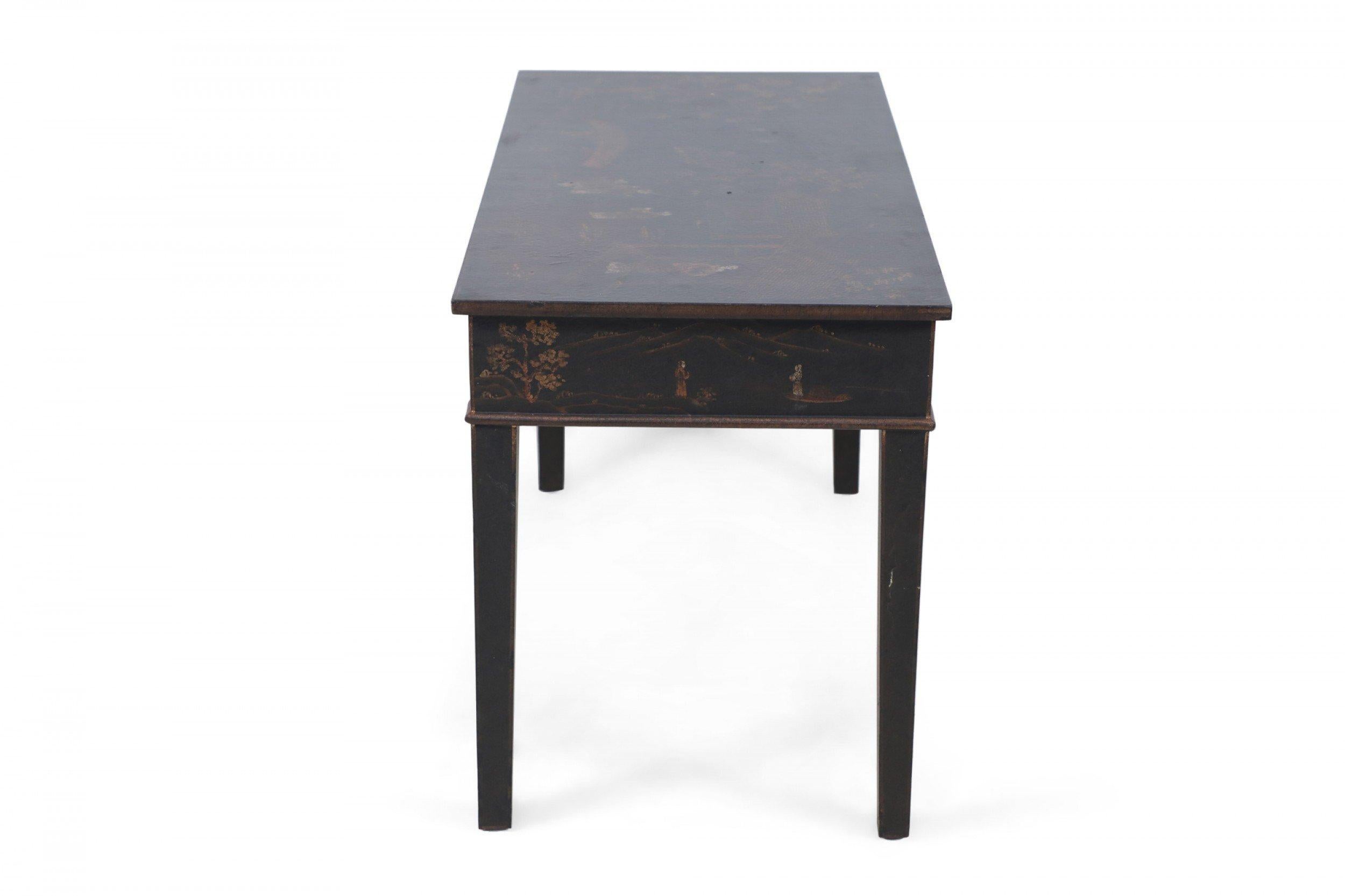 Chinese black writing desk painted with pastoral and figurative scenes on the top surface, sides and across two drawers on the front.